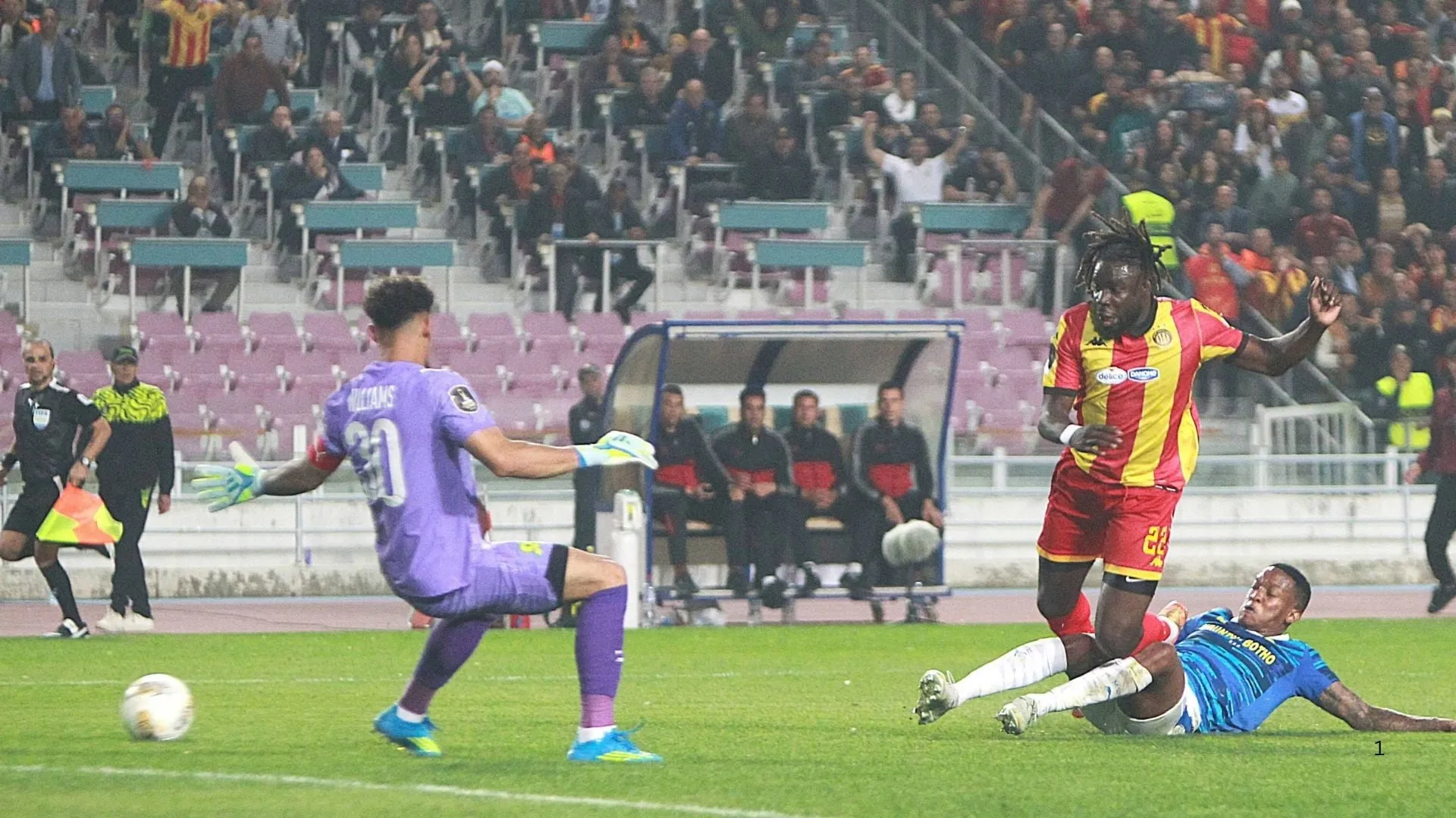 Thomas Danho of Esperance shoots past Mamelodi Sundowns goalkeeper Ronwen Williams.