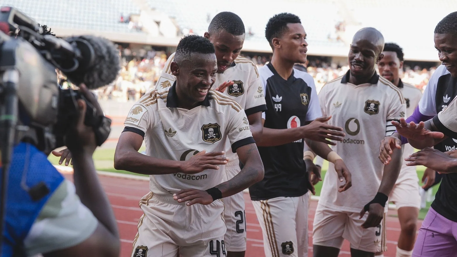 Kabelo Kgotsitsile celebrates his goal with Orlando Pirates teammates.