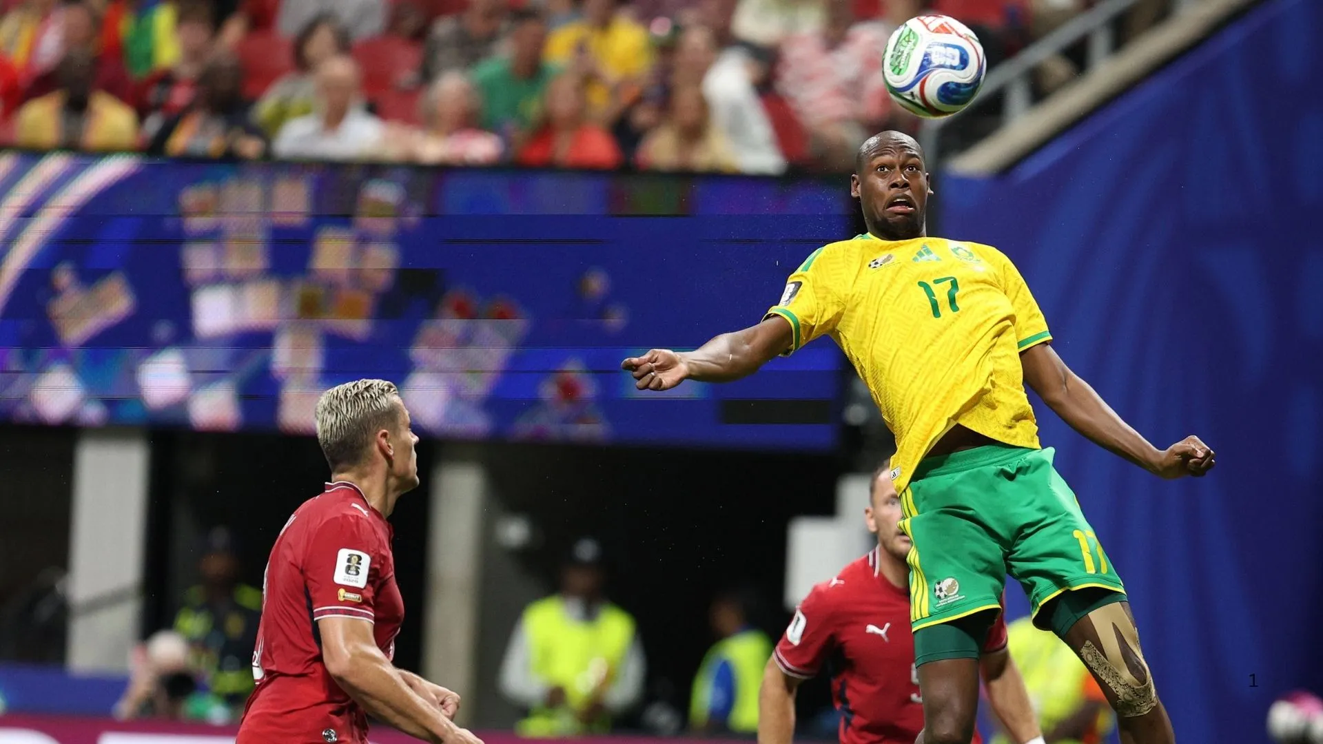 Evidence Makgopa wins an aerial ball against South Korea.