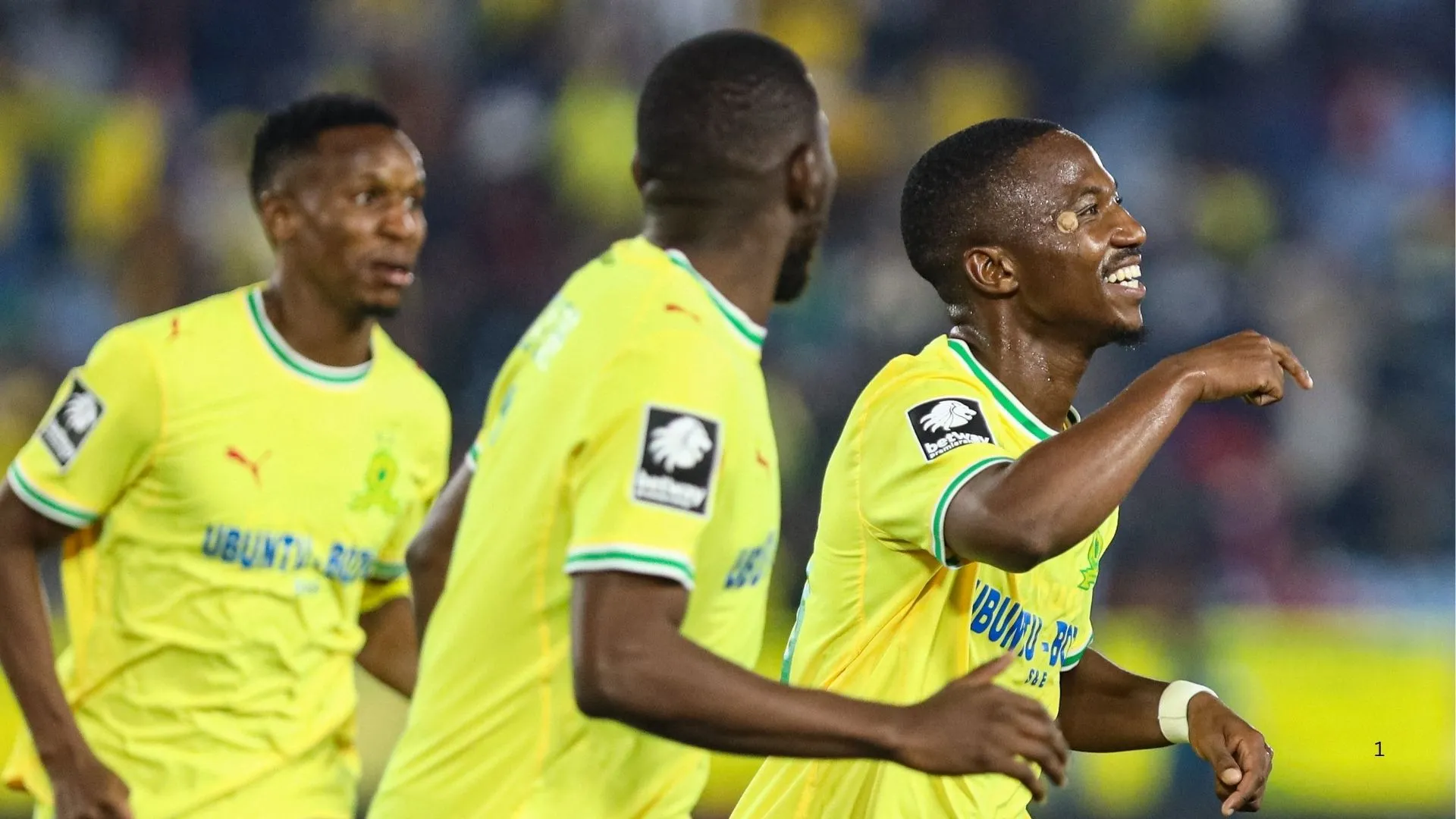 Cassius Mailula celebrates his goal with Mamelodi Sundowns teammates.