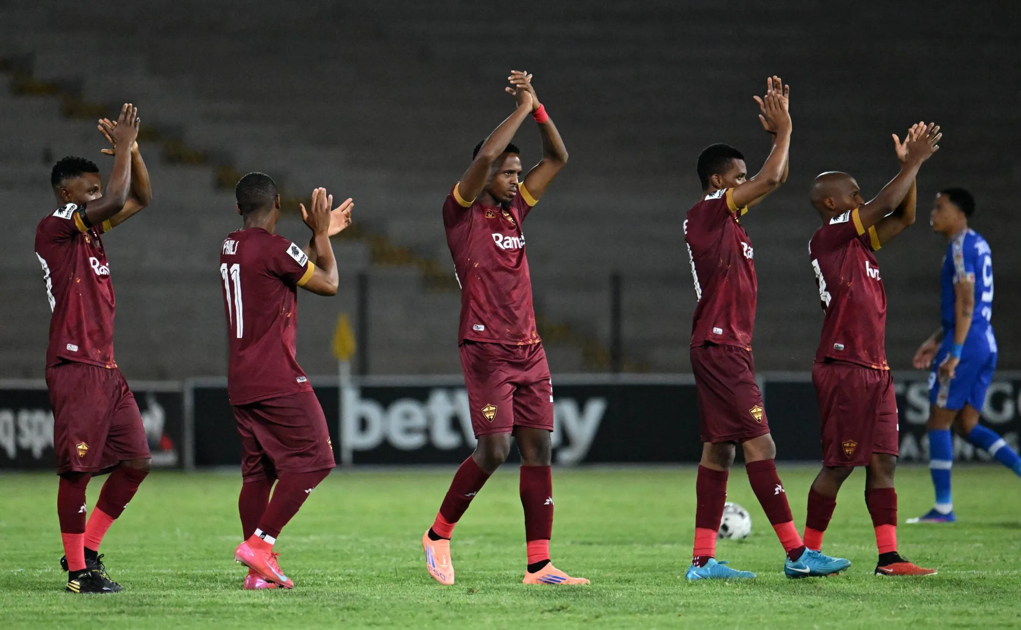 Stellenbosch FC players greet their fans. 