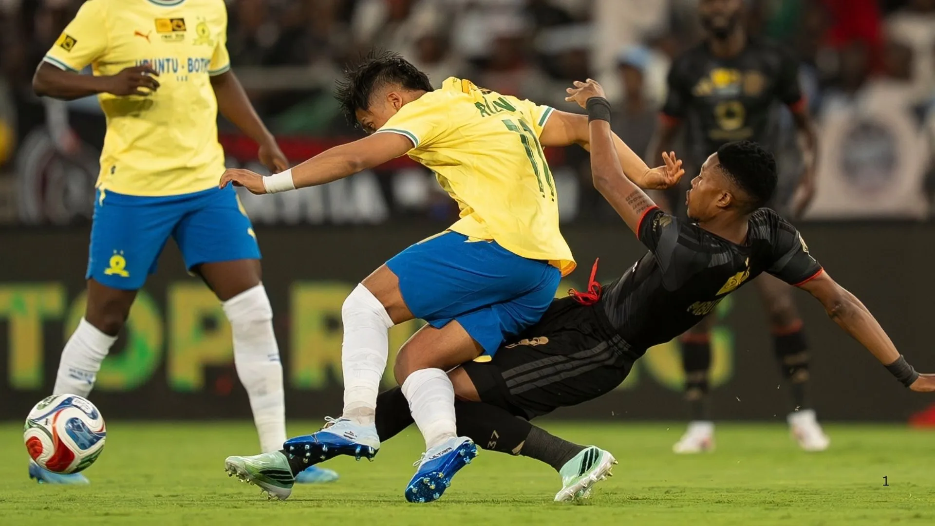 Orlando Pirates striker Yanela Mbuthuma tackles Marcelo Allende of Mamelodi Sundowns in the MTN8 final.