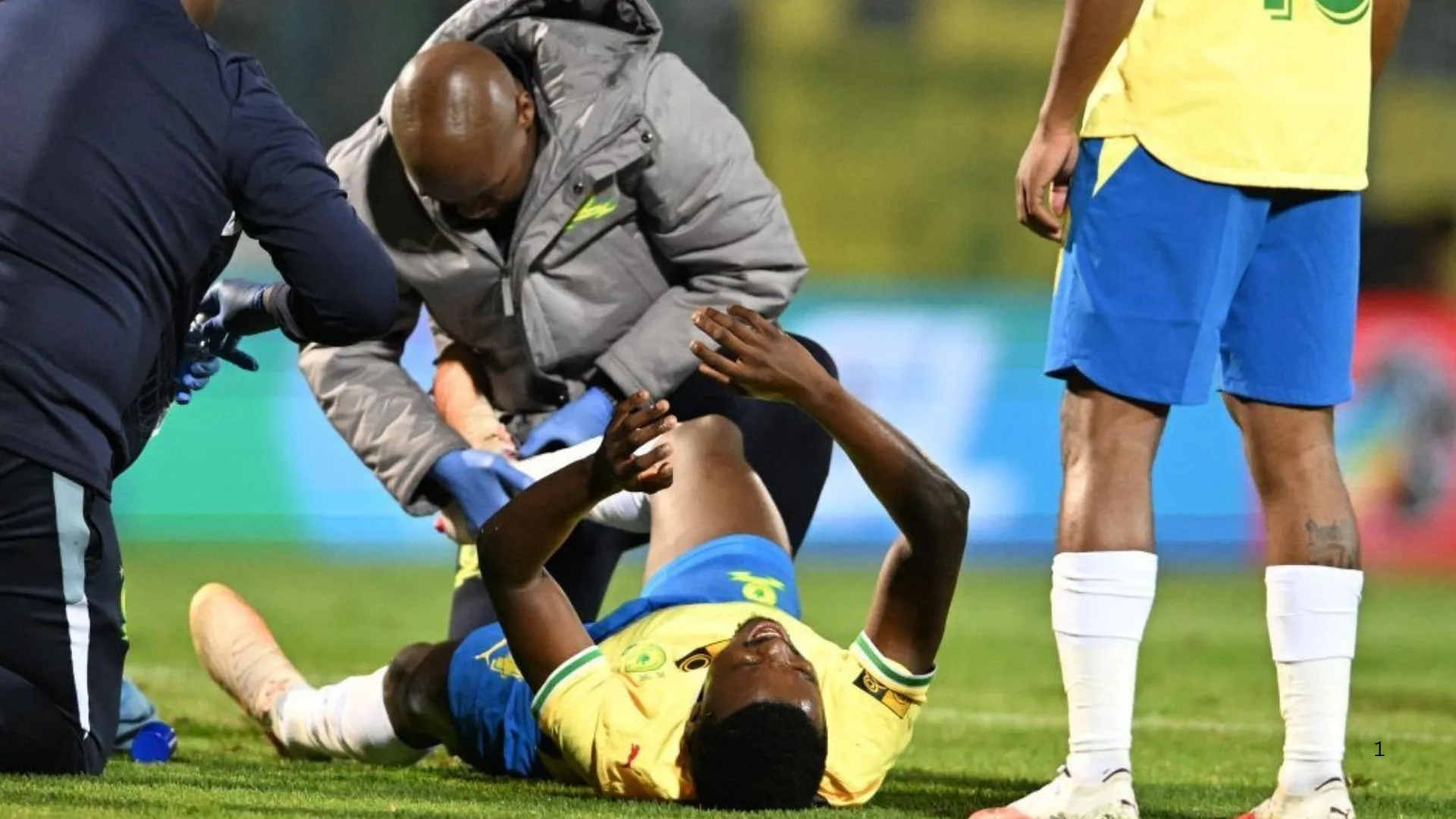 Teboho Mokoena came off worse after a tackle from Surprise Mathonsi.