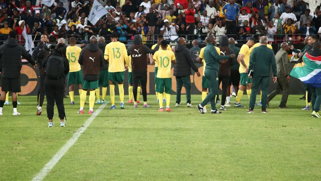 Bafana Bafana players applaud fans.