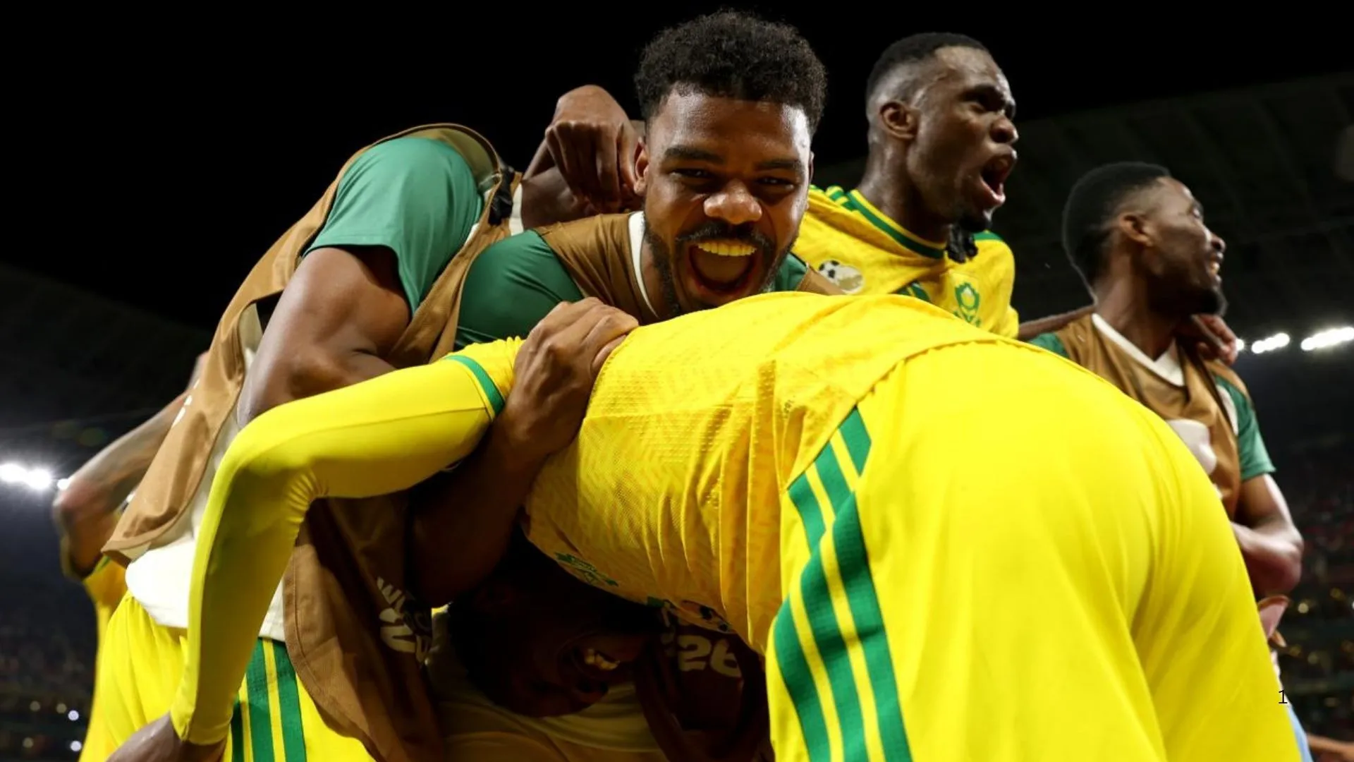Bafana Bafana players celebrate victory against South Korea.