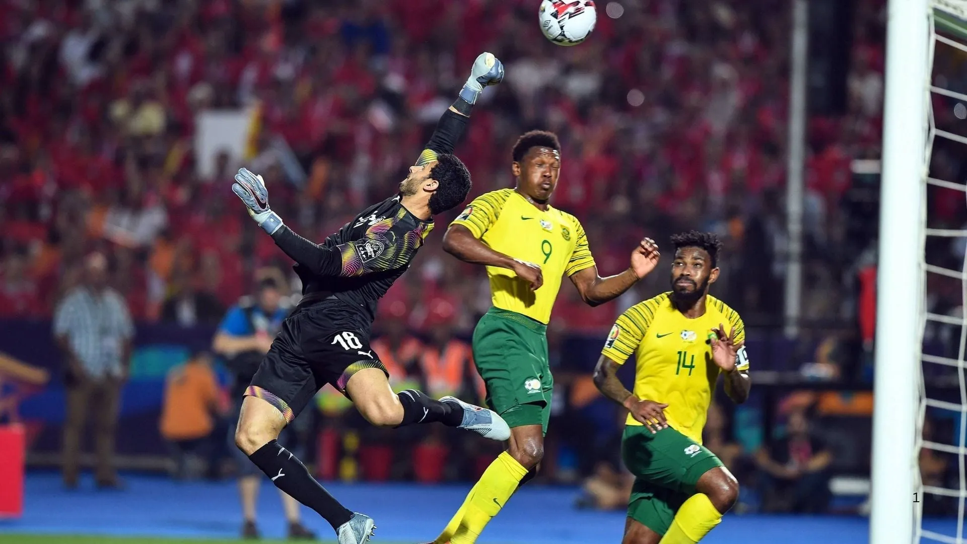 South Africa head past Egypt goalkeeper.