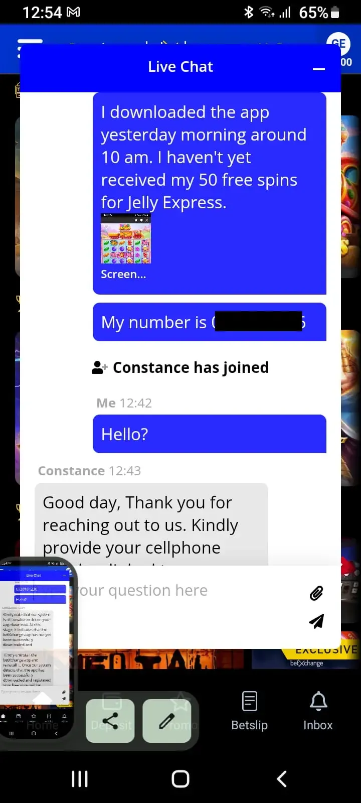 BetXchange customer support live chat screen showing a user inquiry regarding missing 50 free spins on Jelly Express.