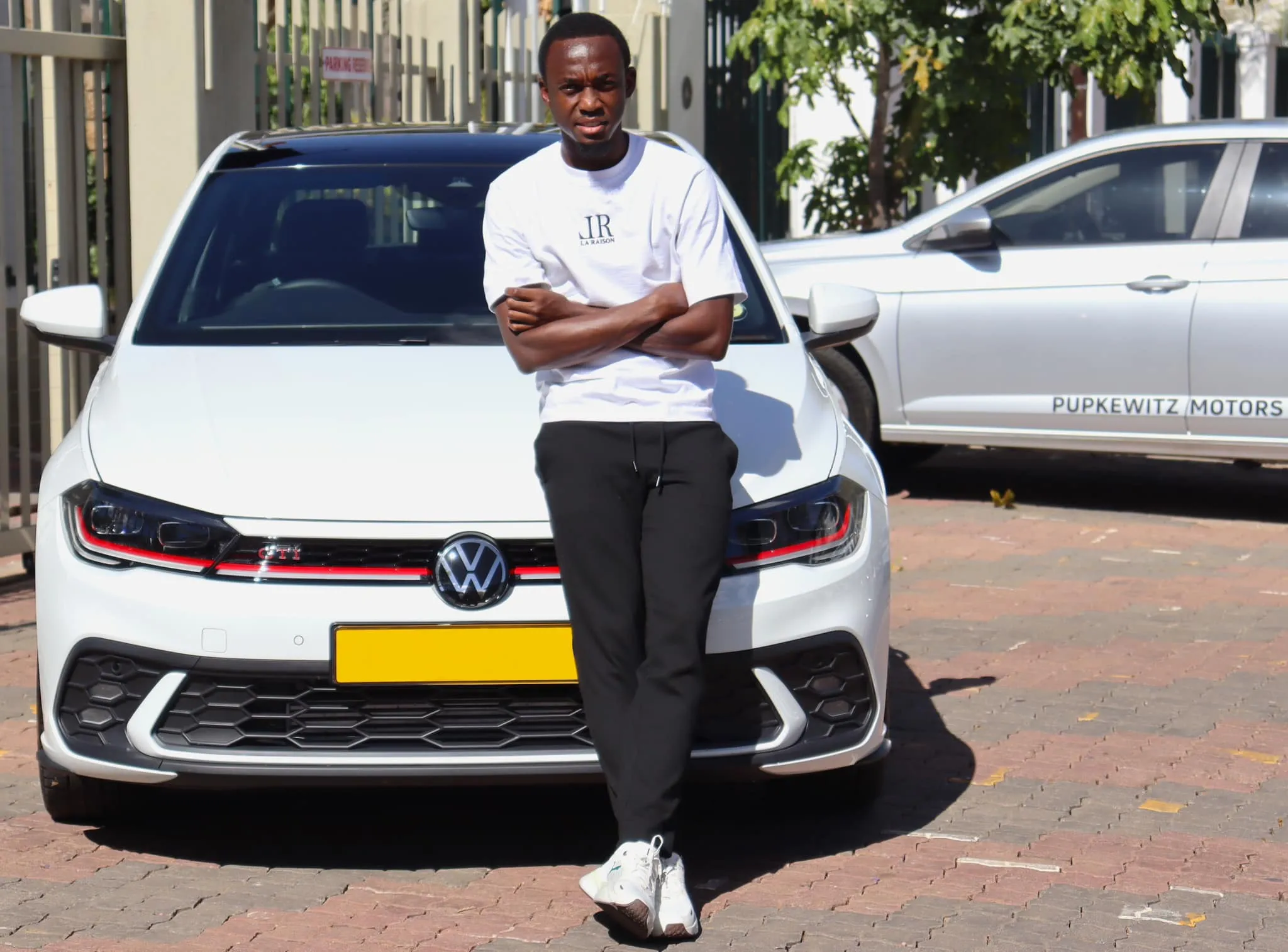 Peter Shalulile with his VW car.