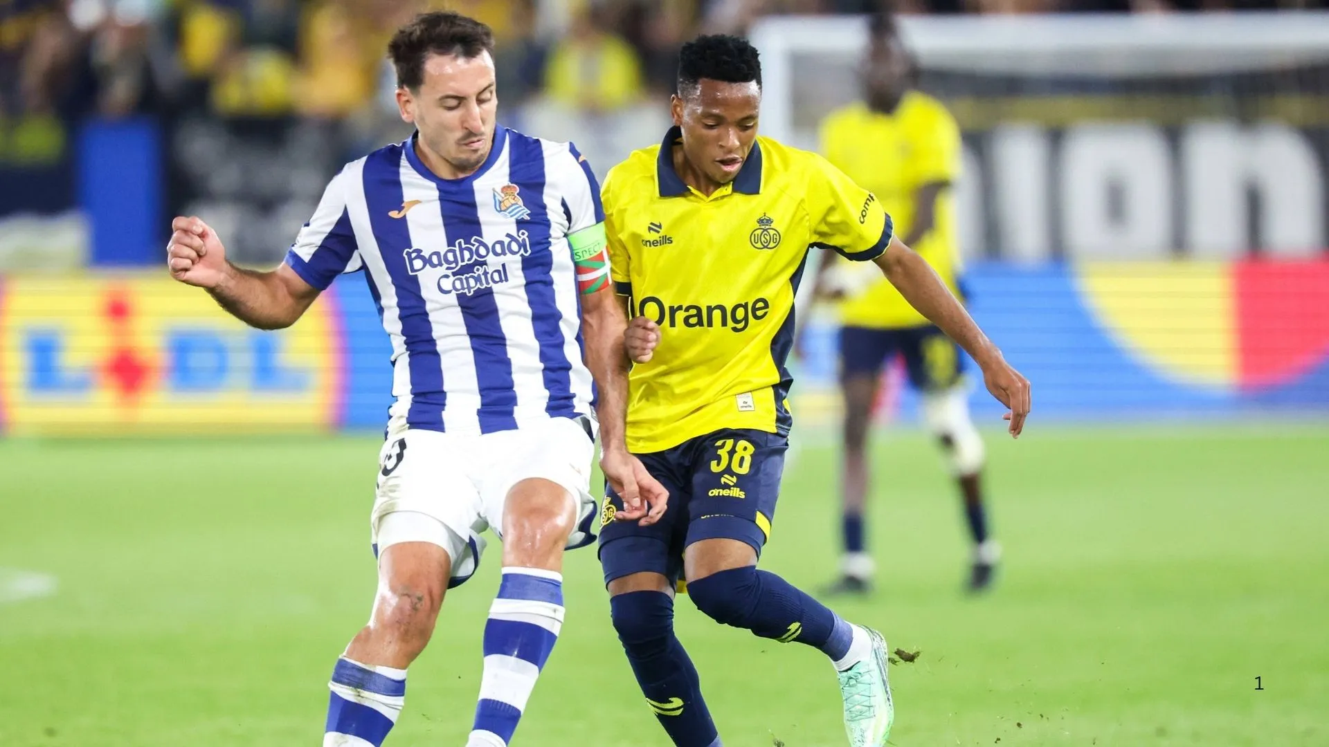 Mikel Oyarzabal of Real Sociedad and Relebohile Mofokeng fight for the ball during their Europa League clash.
