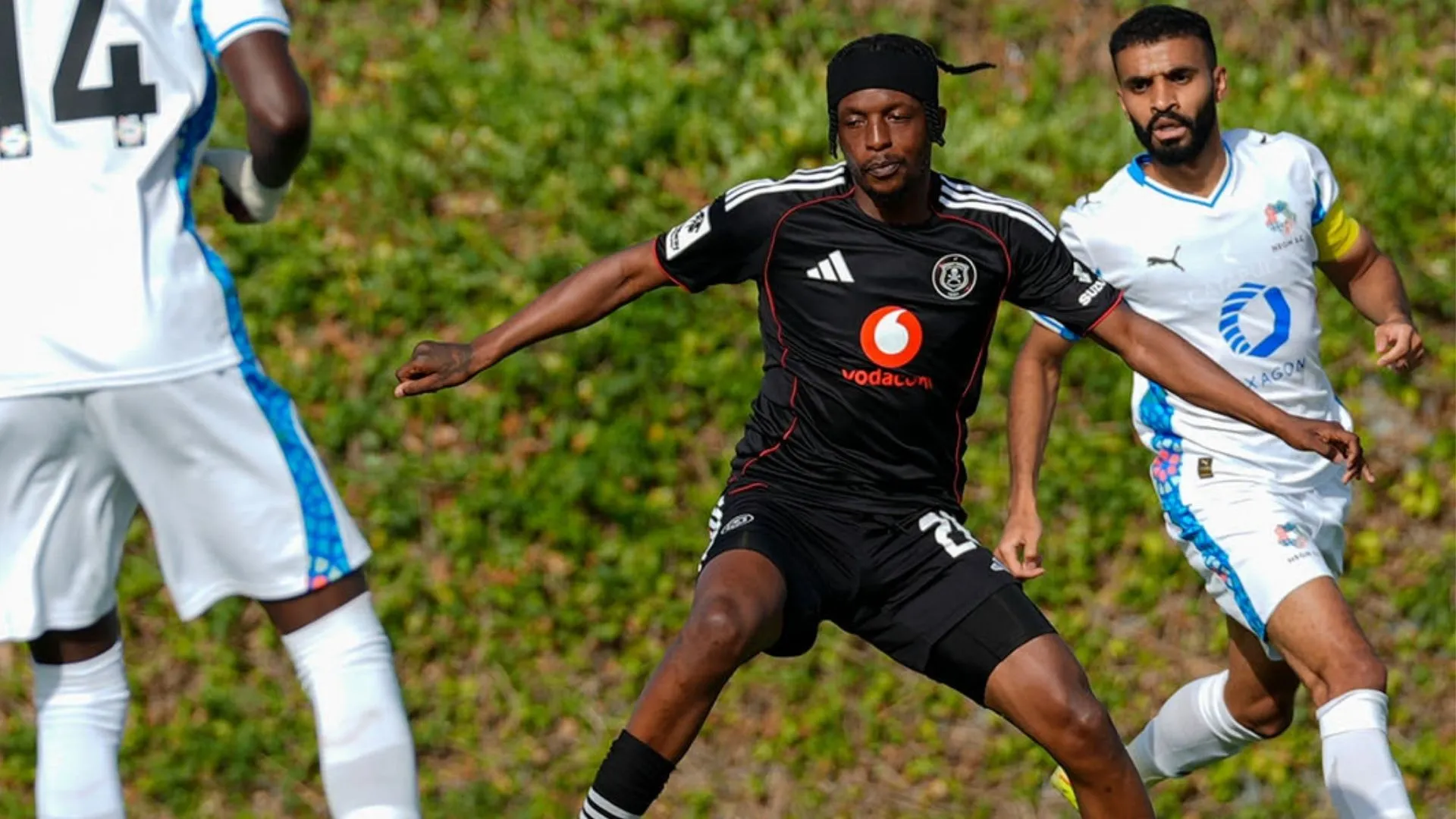 Patrick Maswangayi of Orlando Pirates in action against FC Neom.