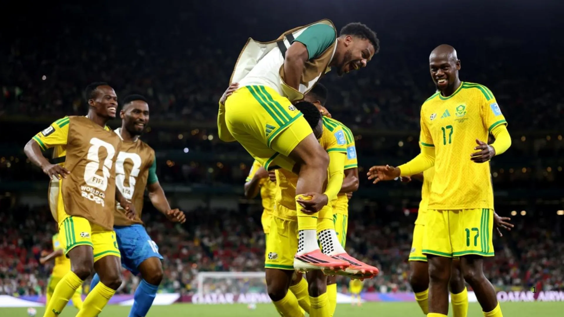 South Africa players celebrate World Cup victory against South Korea.