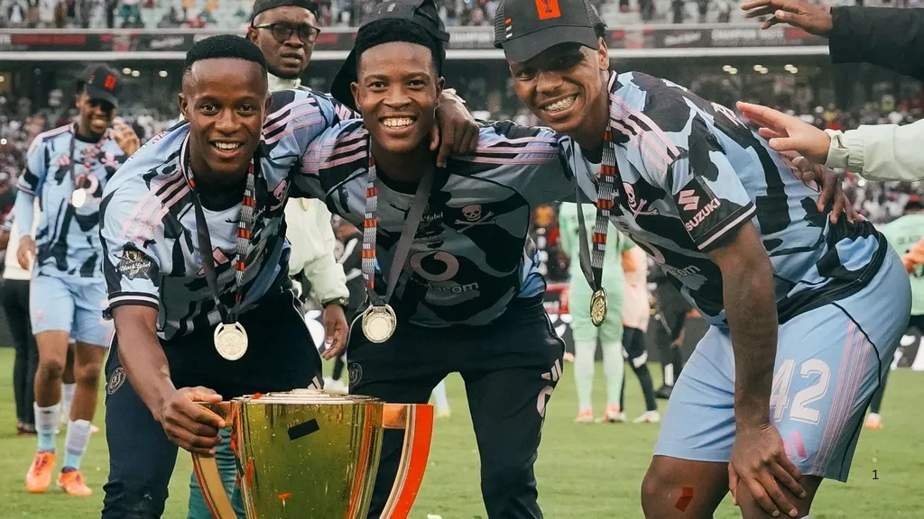 Orlando Pirates players celebrate Carling Black Label Cup win