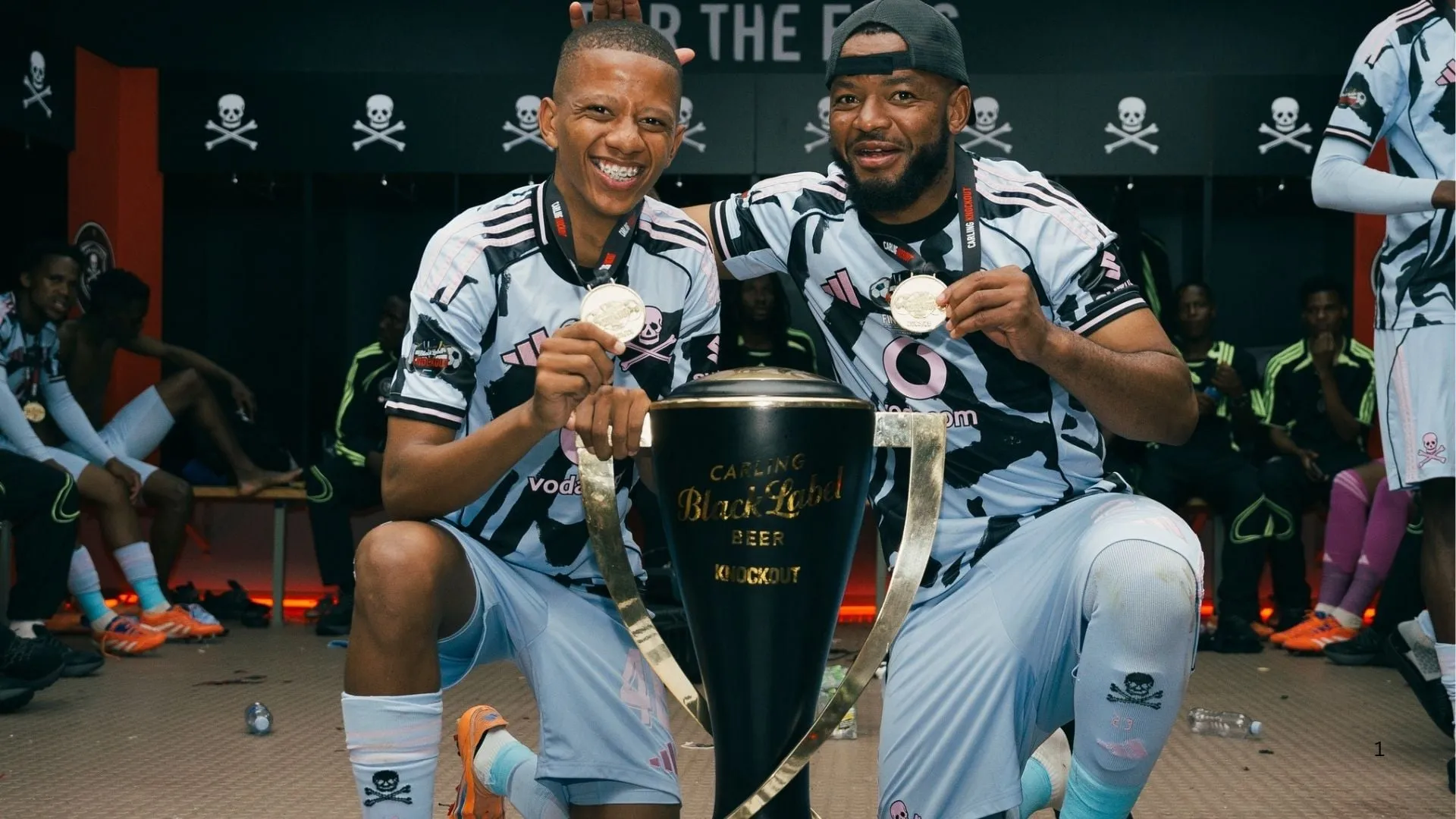 Cemran Dansin and Sipho Mbule celebrate Carling Knockout glory. Photo &ndash; Orando Pirates