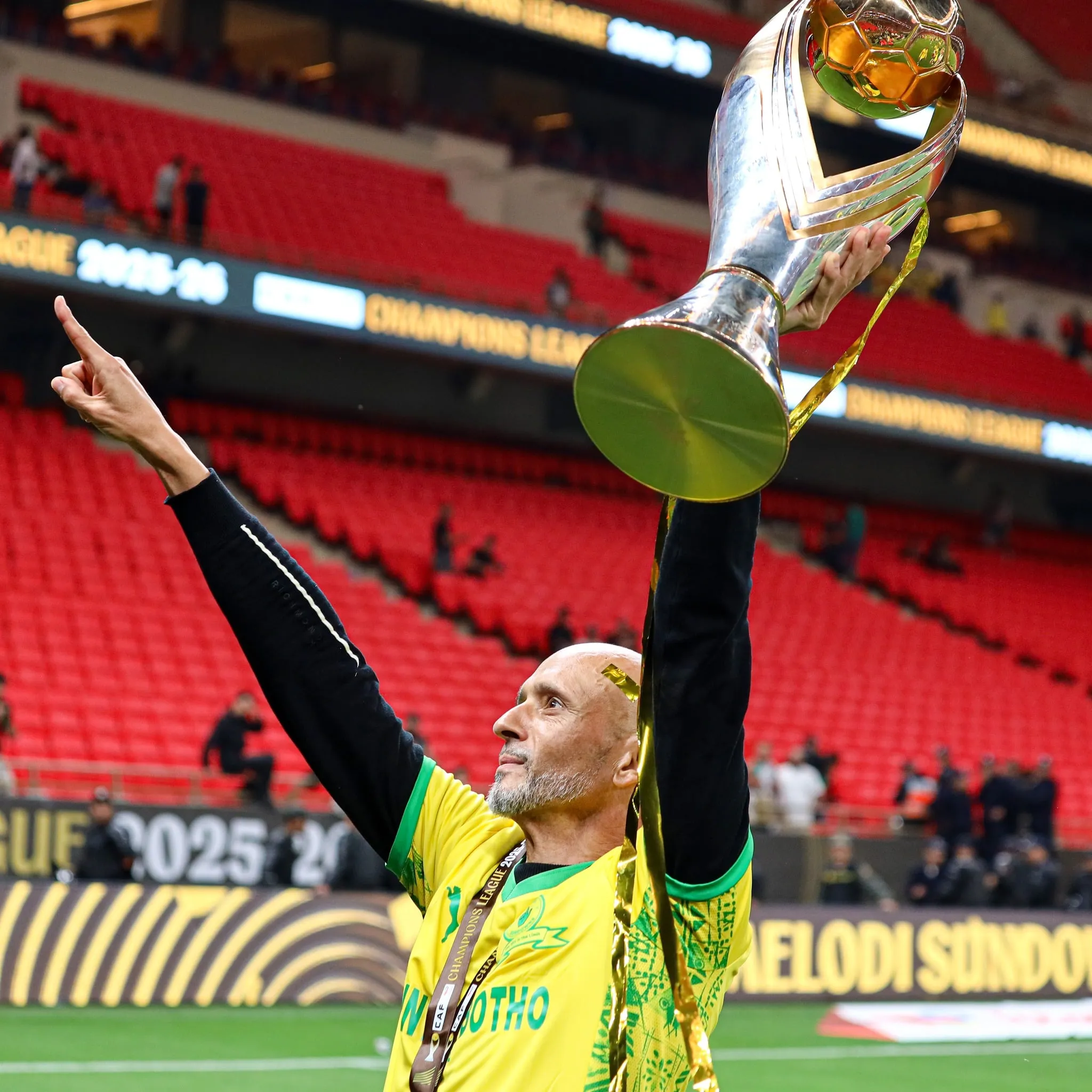 Miguel Cardoso with the CAF Champions League trophy.