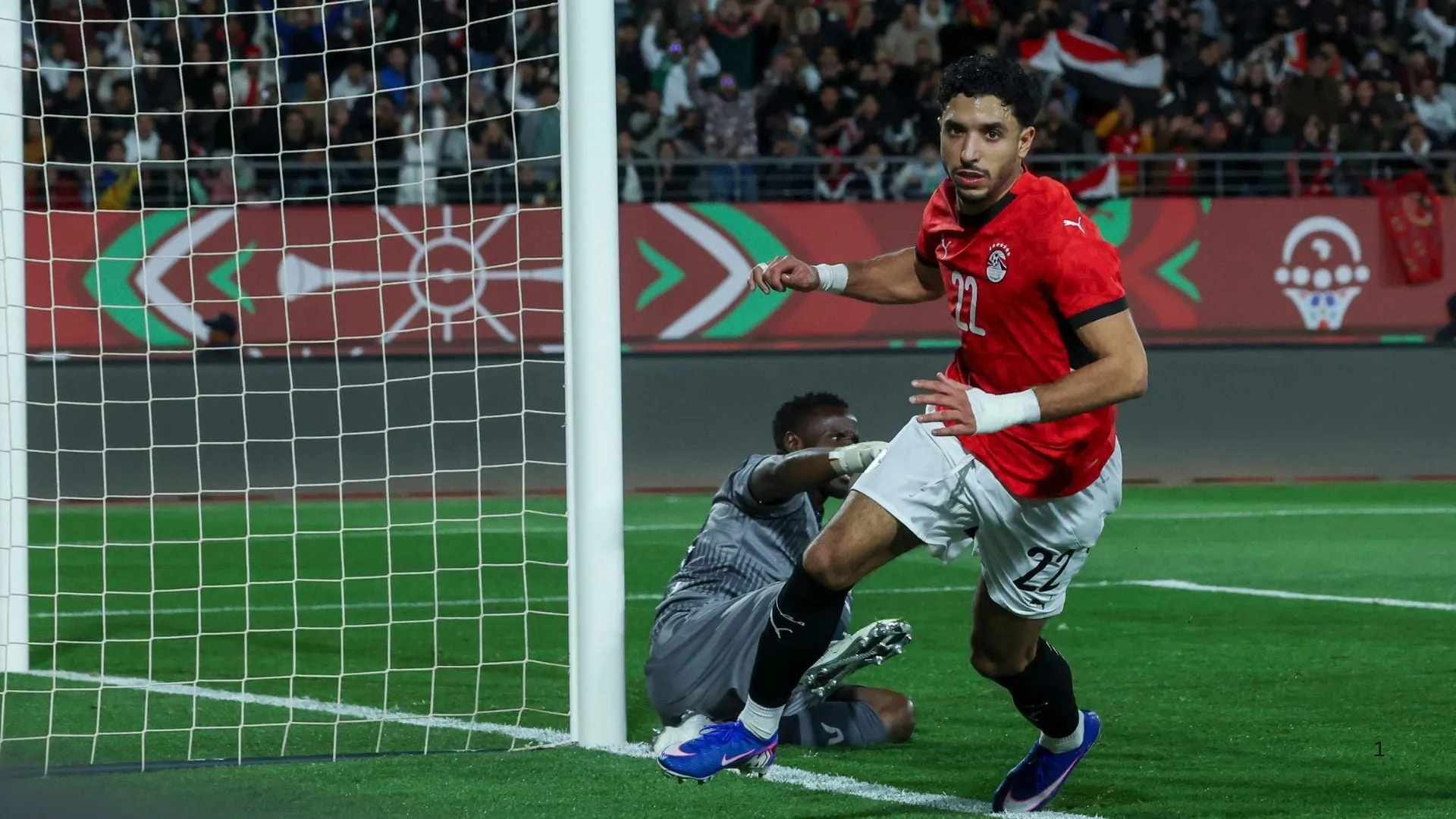 Omar Marmoush of Egypt celebrates scoring against Zimbabwe.