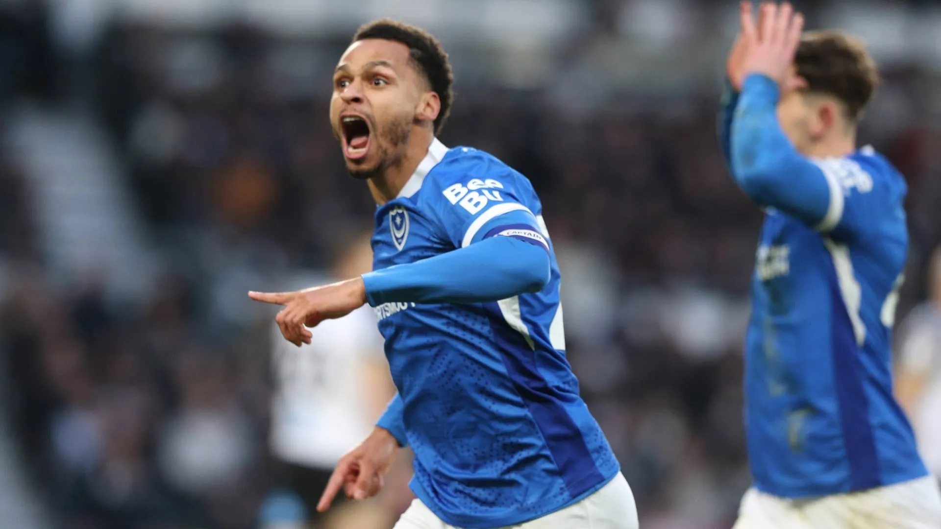 Josh Murphy of Portsmouth celebrating a goal against Derby County