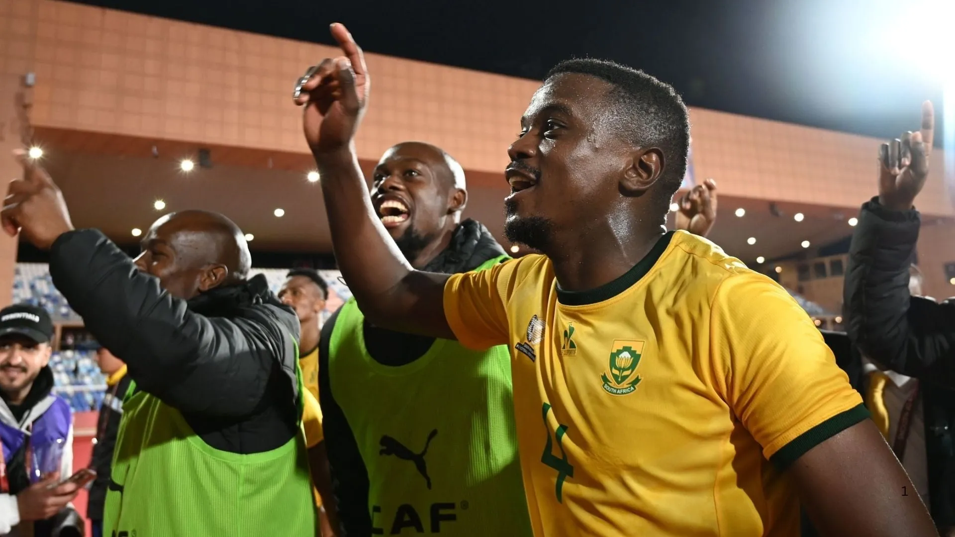 Teboho Mokoena, Evidence Makgopa and Nkosinathi Sibisi celebrate AFCON win over Angola. Photo &ndash; SAFA