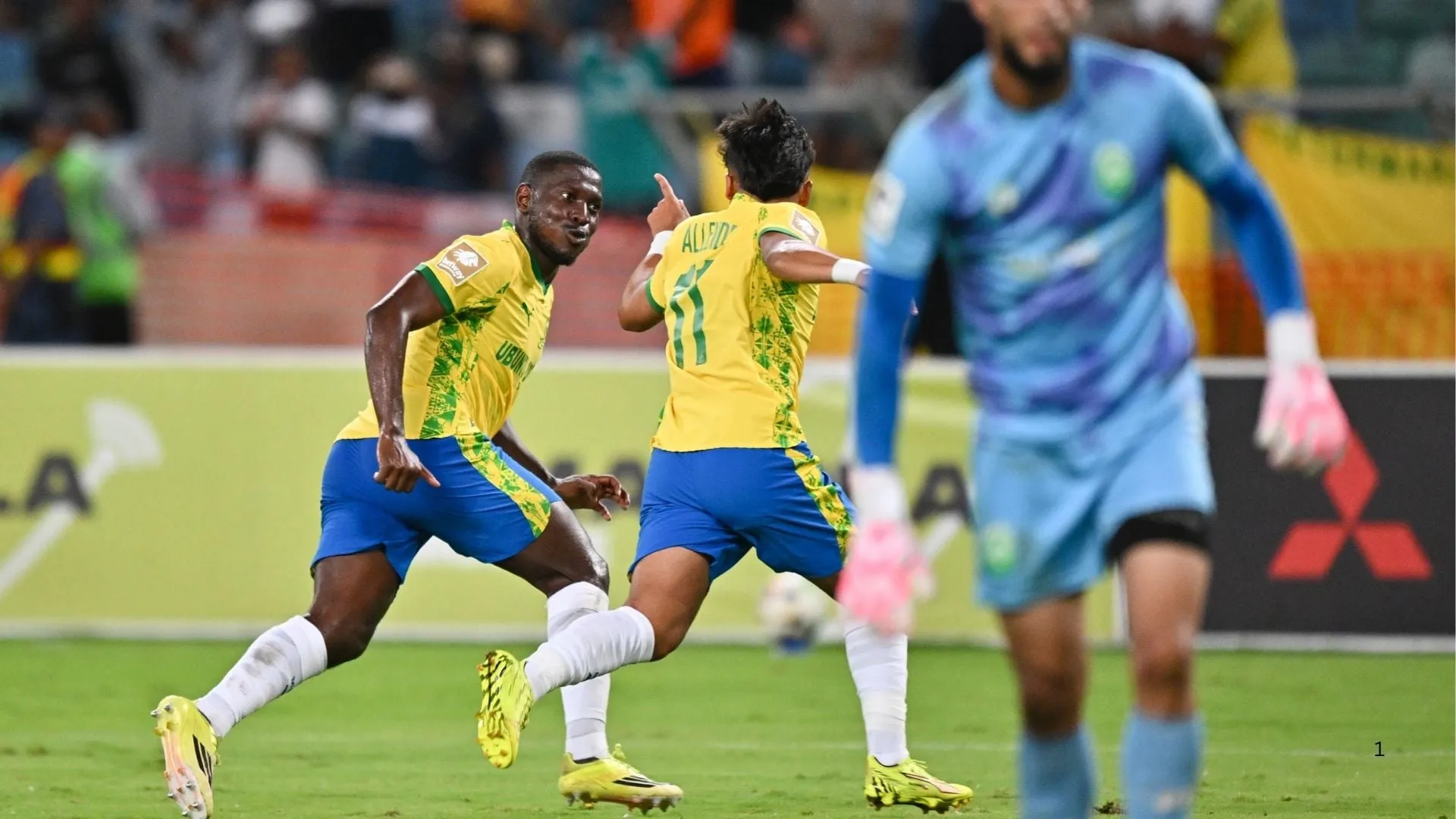 Mamelodi Sundowns players Marcelo Allende and Aubrey Modiba celebrate a goal. 