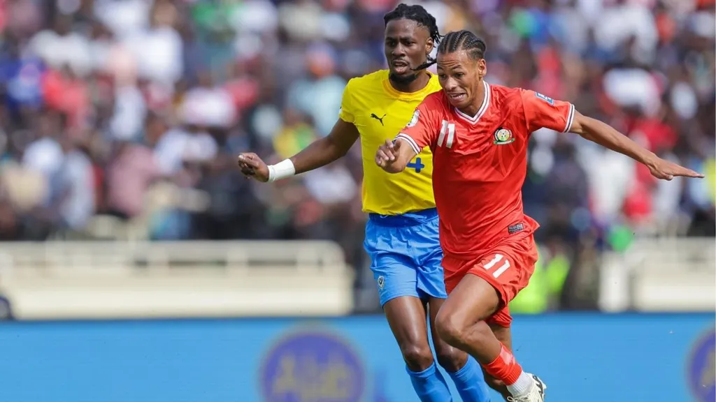 Kenya&rsquo;s William Lenkupae vies for the ball with Alex Moucketou Moussounda of Gabon. Photo &ndash; FKF