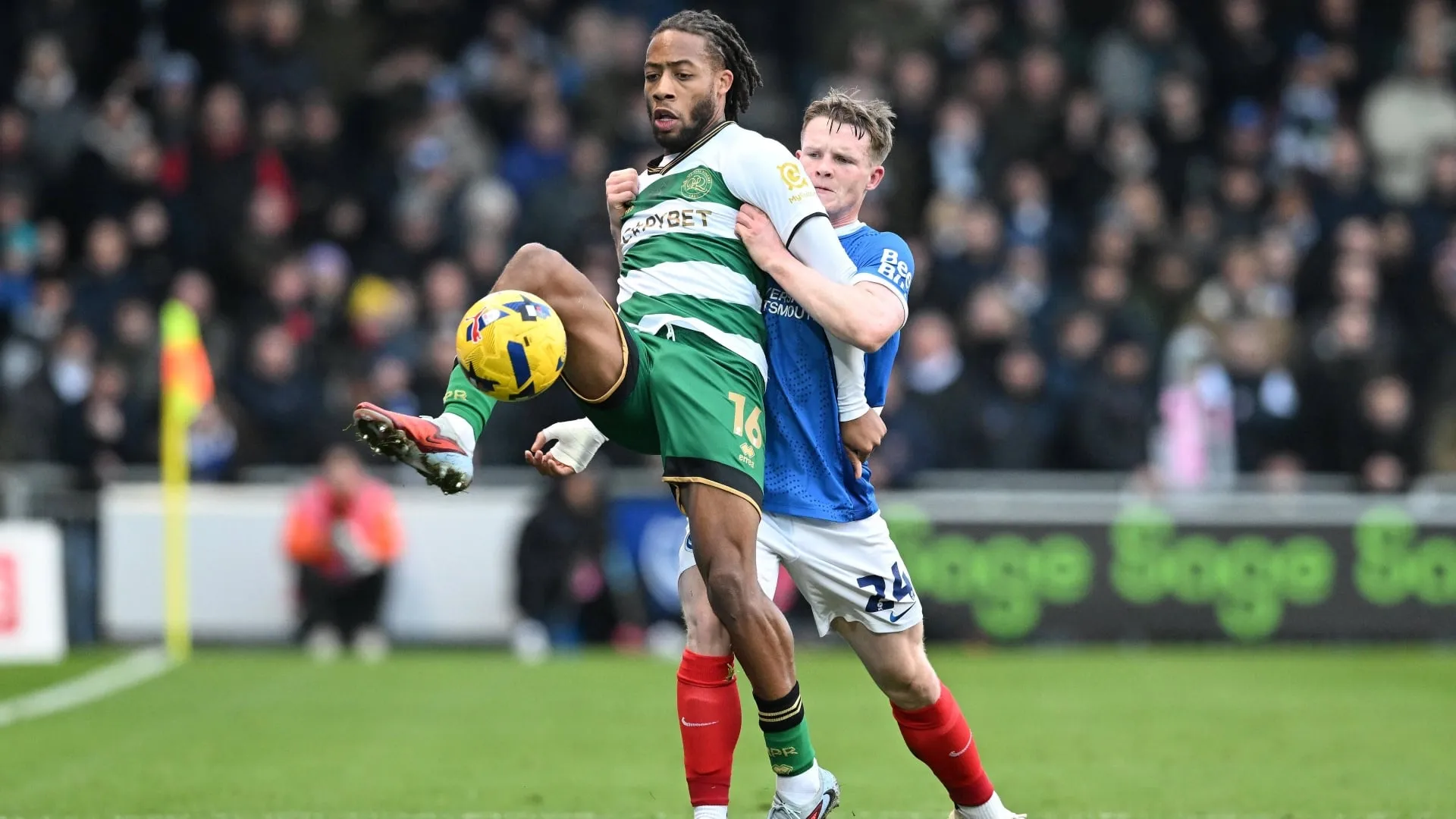 Rumarn Burrell of QPR in action