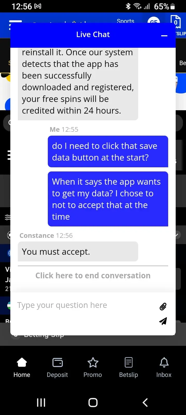 BetXchange live chat agent message confirming that app tracking permissions must be accepted to receive the 50 free spins bonus.