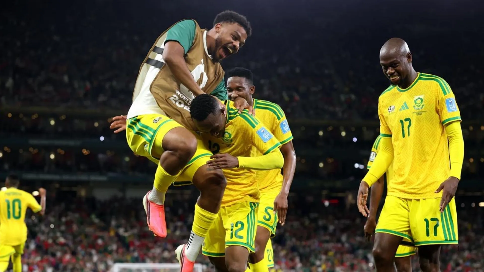 South Africa players celebrate their goal against South Korea.