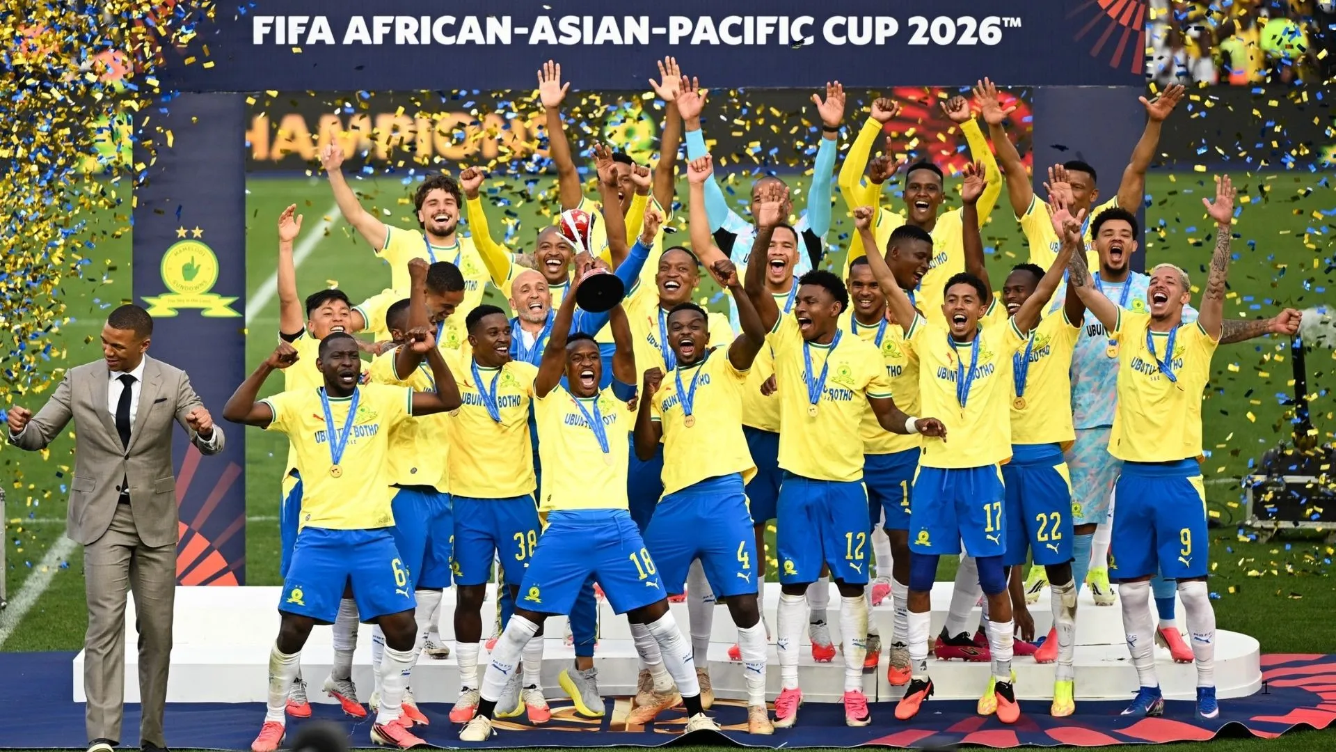 Mamelodi Sundowns players celebrate after winning the FIFA Afrian Asian Pacific Cup.