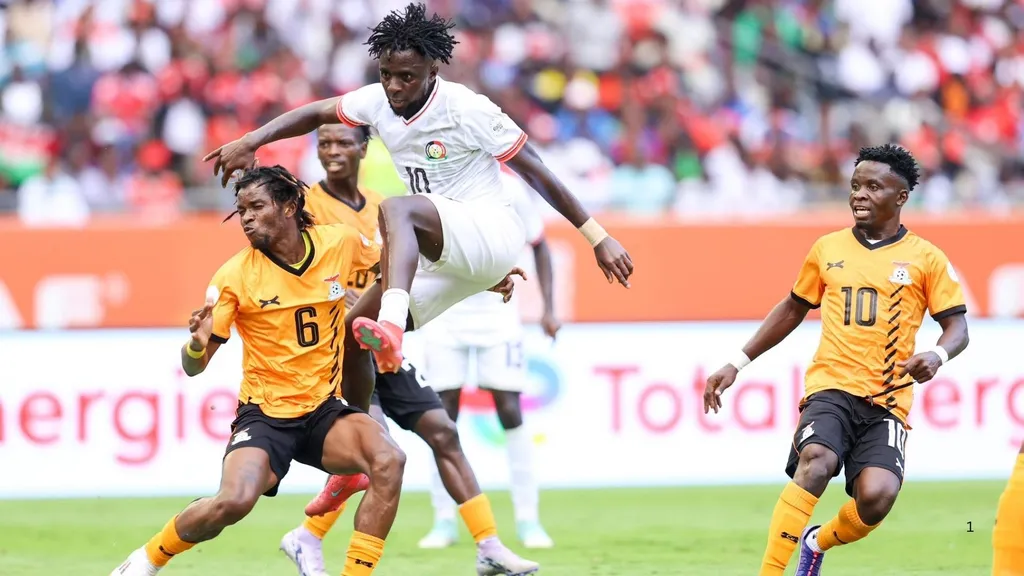 Kenyas Austin Odhiambo vies for the ball during their CHAN 2024 match with Zambia