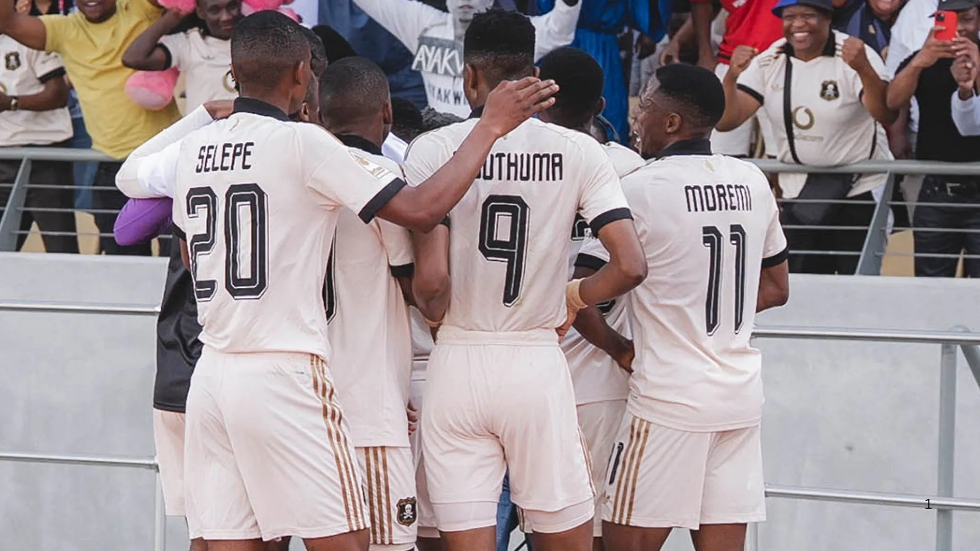 Orlando Pirates players celebrate a goal.