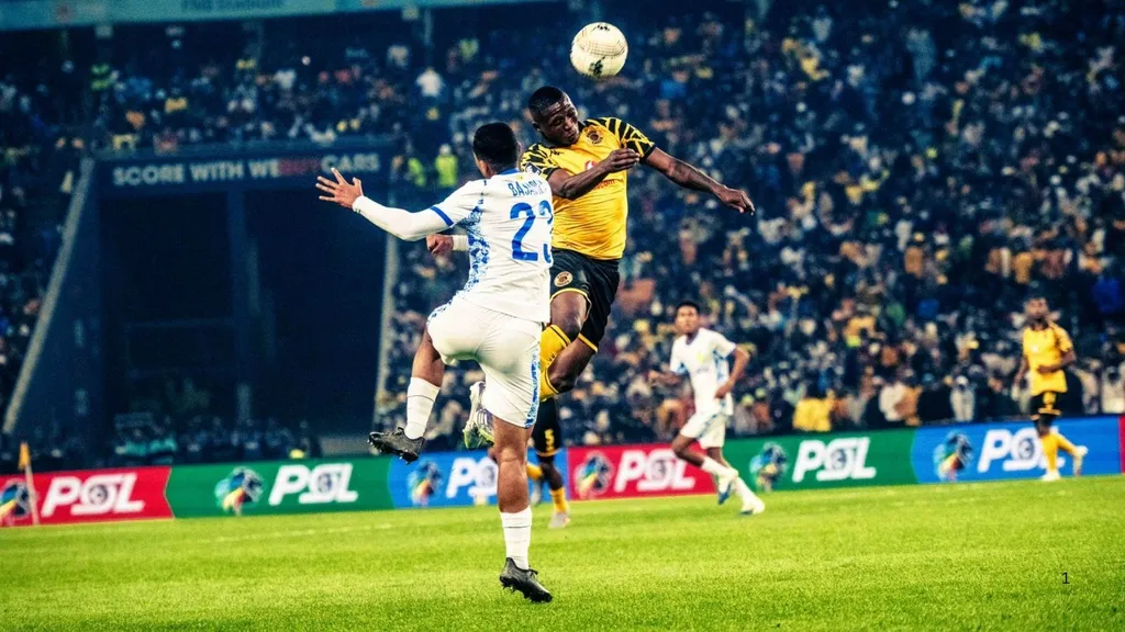 Thabiso Monyane and Fawaaz Basadien vie for the ball during Kaizer Chiefs and Mamelodi Sundowns match