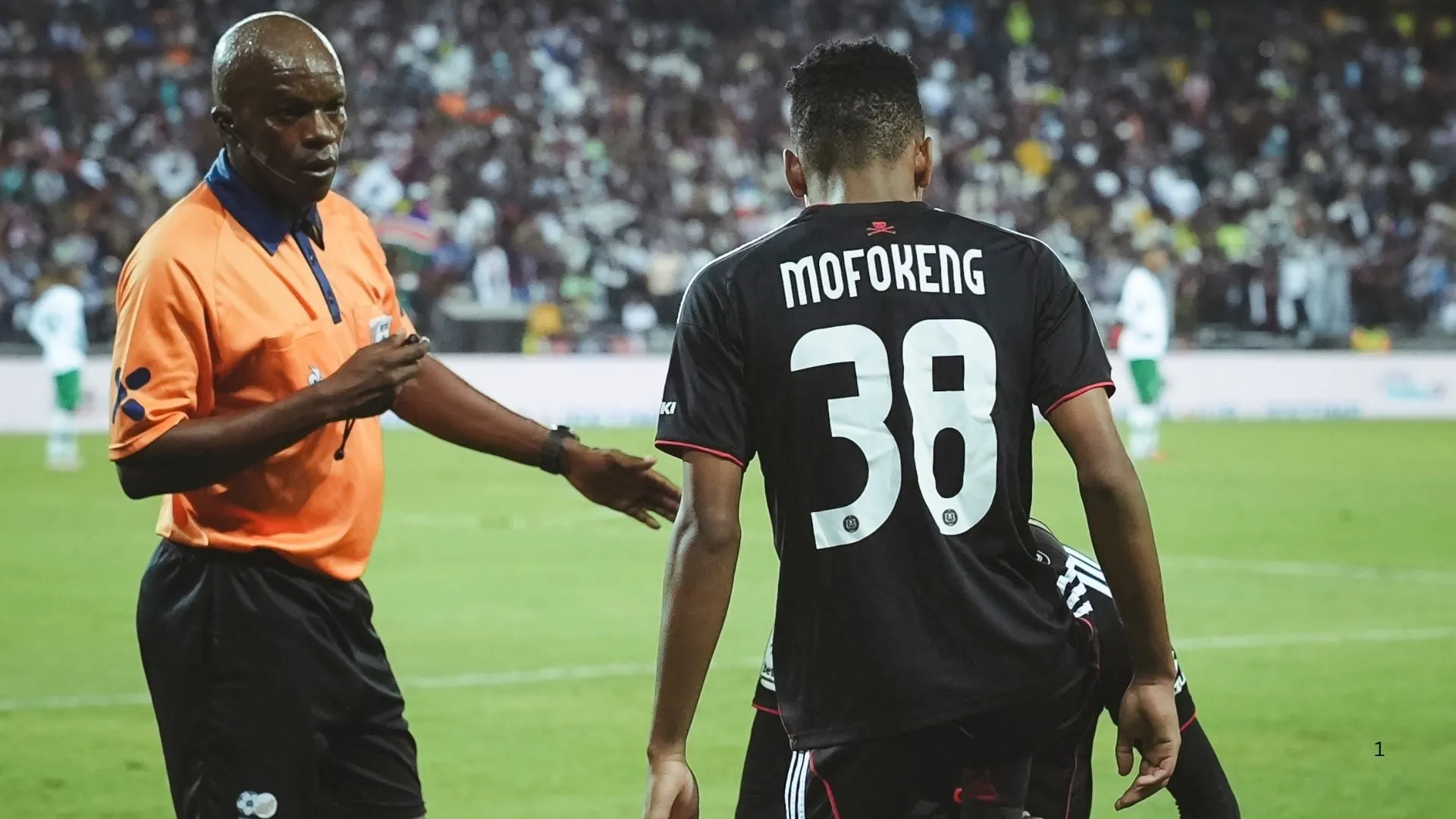 Orlando Pirates forward Rele Mofokeng celebrates with teammate