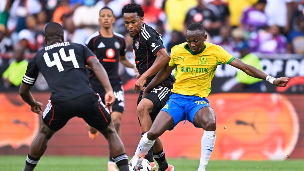 Peter Shalulile vies for the ball with Masindi Nemtajela and Mbekezeli Mbokazi. 