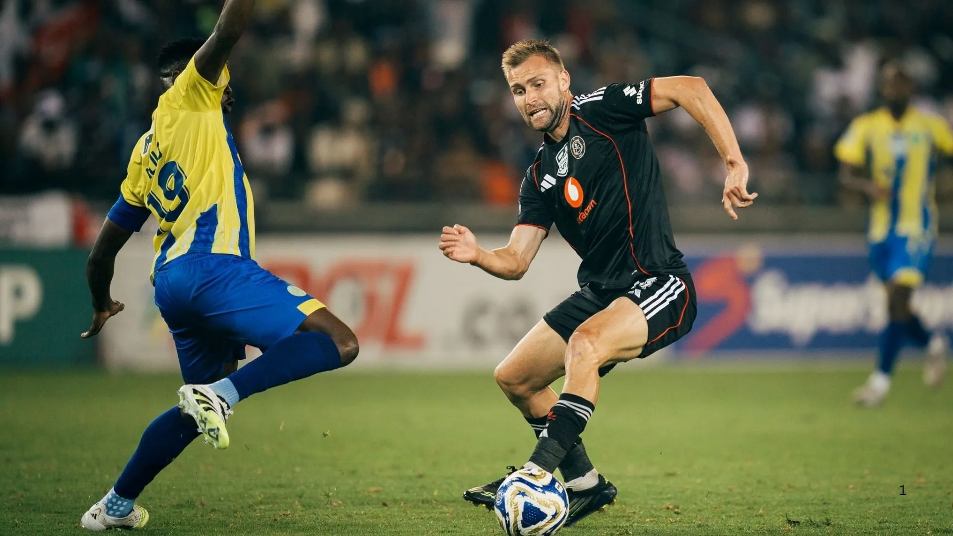 Charles Tchouplaou of Casric Stars (left) with Andre de Jong of Orlando Pirates during the Nedbank Cup. Photo &ndash; Orlando Pirates