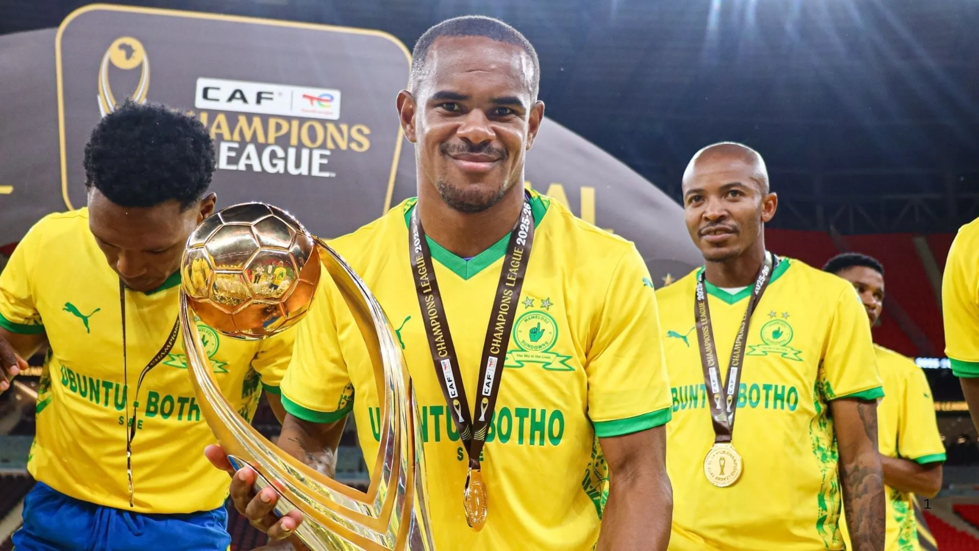 Lebo Mothiba, Iqraam Rayners and Thapelo Morena of Mamelodi Sundowns celebrate CAF Champions League glory.