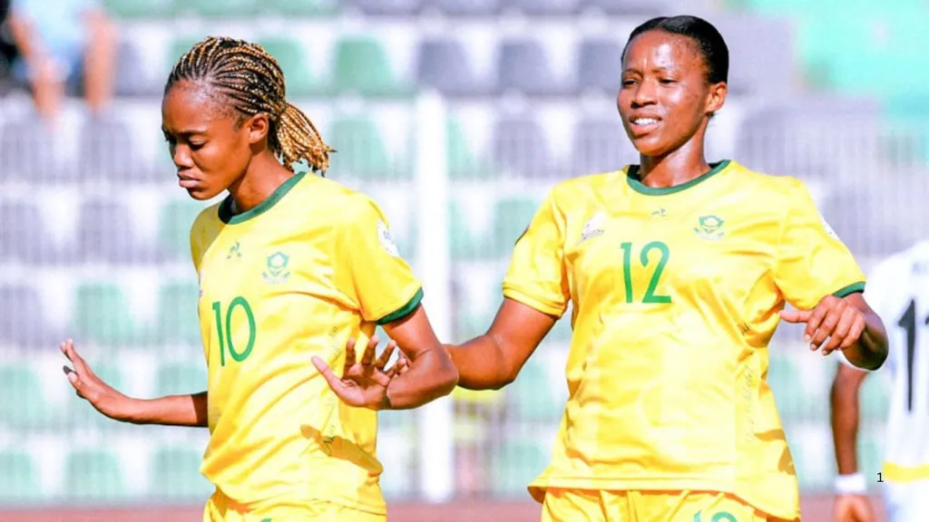 Banyana Banyana's Linda Motlhalo and Jermaine Seoposenwe celebrate a goal against Ghana at WAFCON 20224. Photo - CAF