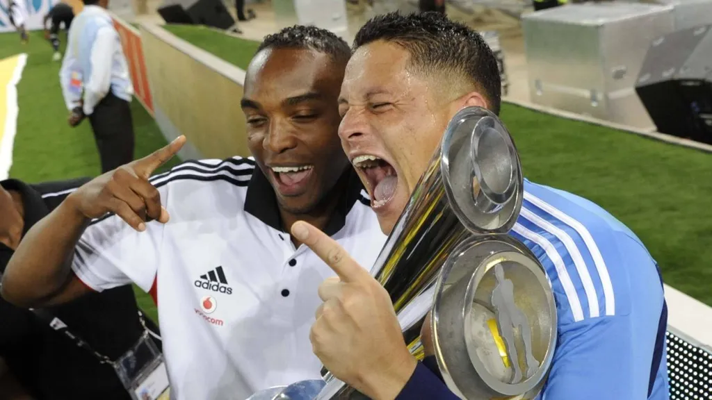 Benni McCarthy and Moeneeb Josephs after winning the 2011 MTN8 final. Photo Imago