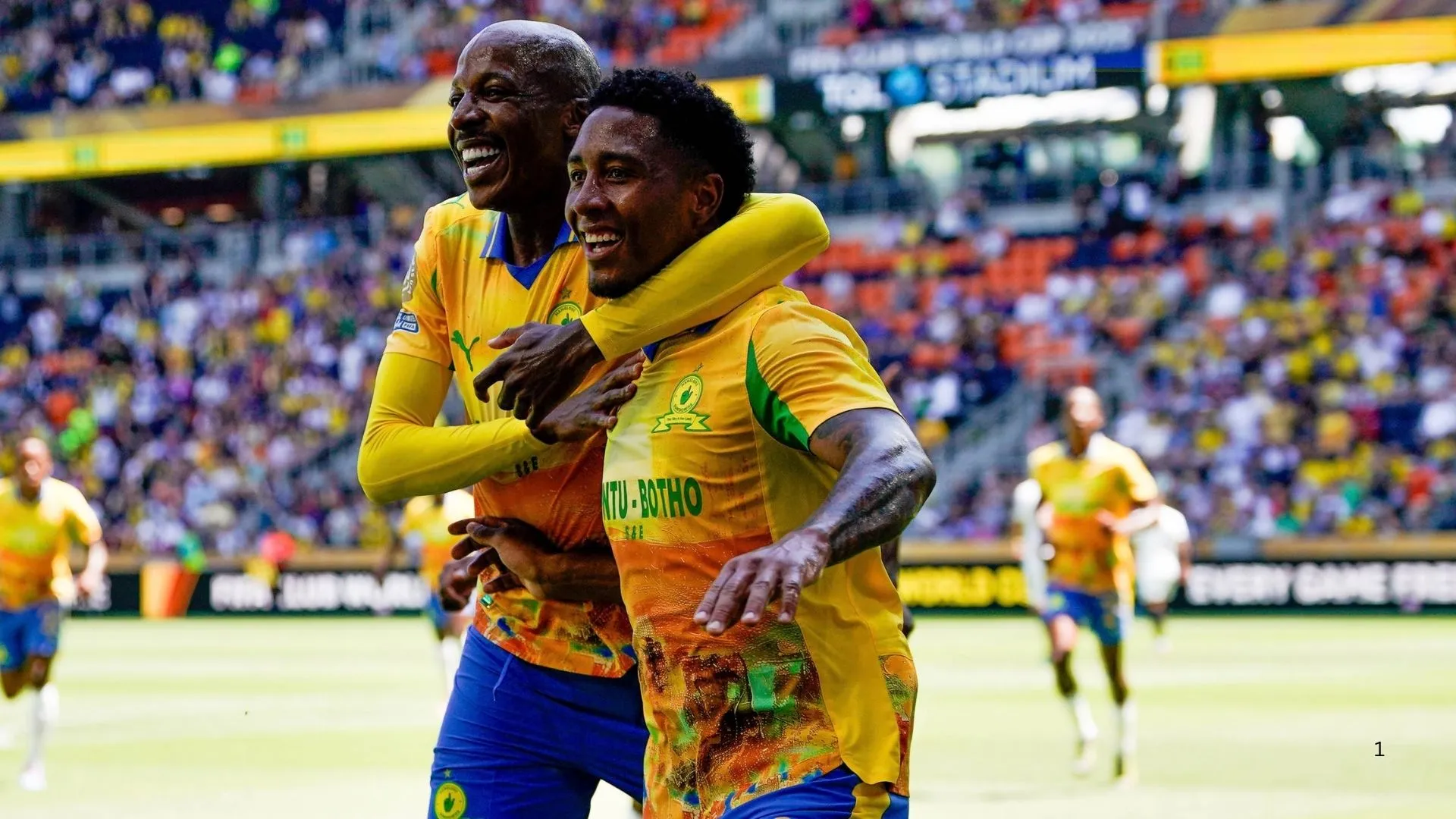 Lucas Robeiro and Khuliso Muadu celebrate a goal at the FIFA Club World Cup.