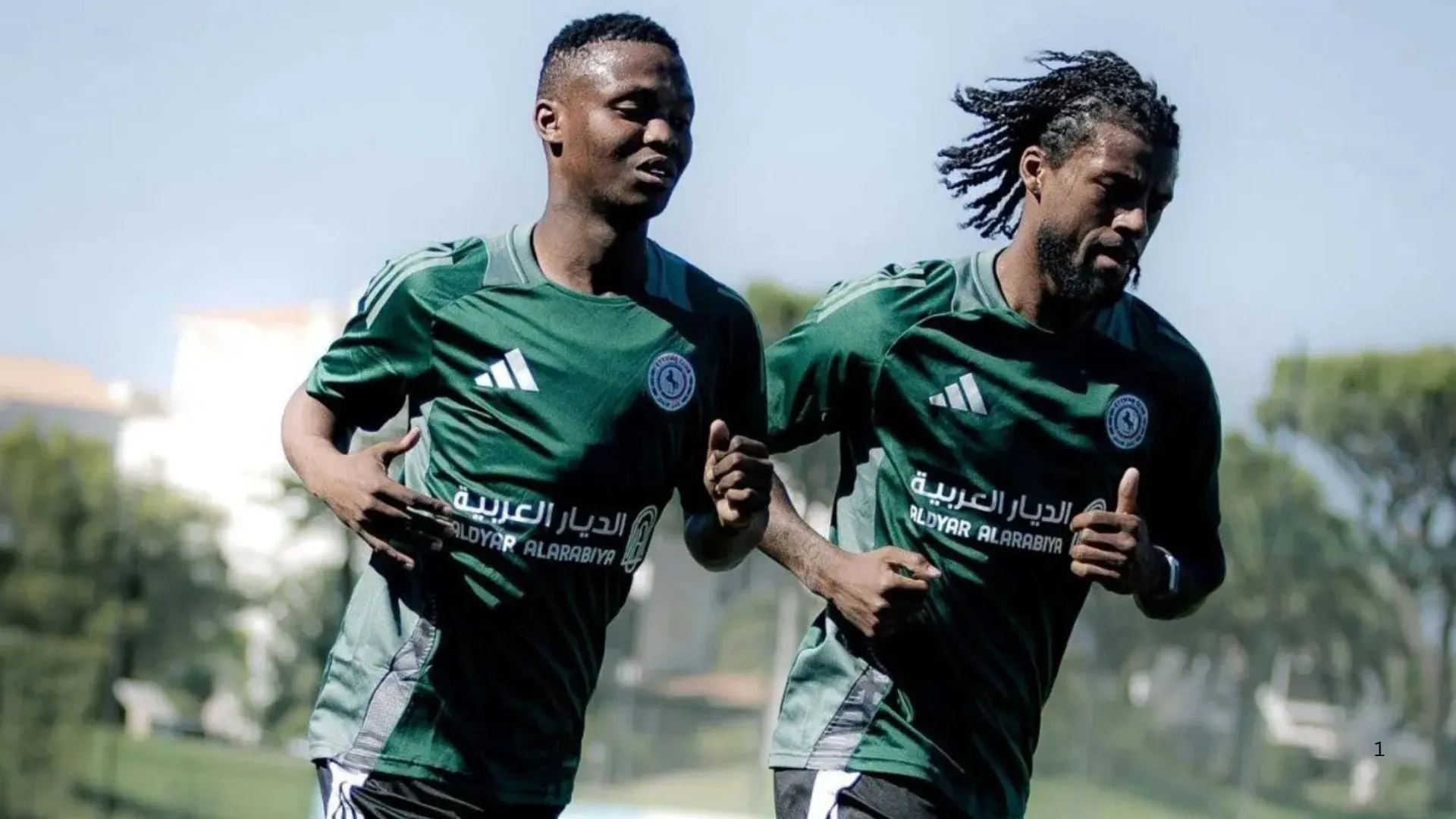 Mohau Nkota and Georginio Wijnaldum 