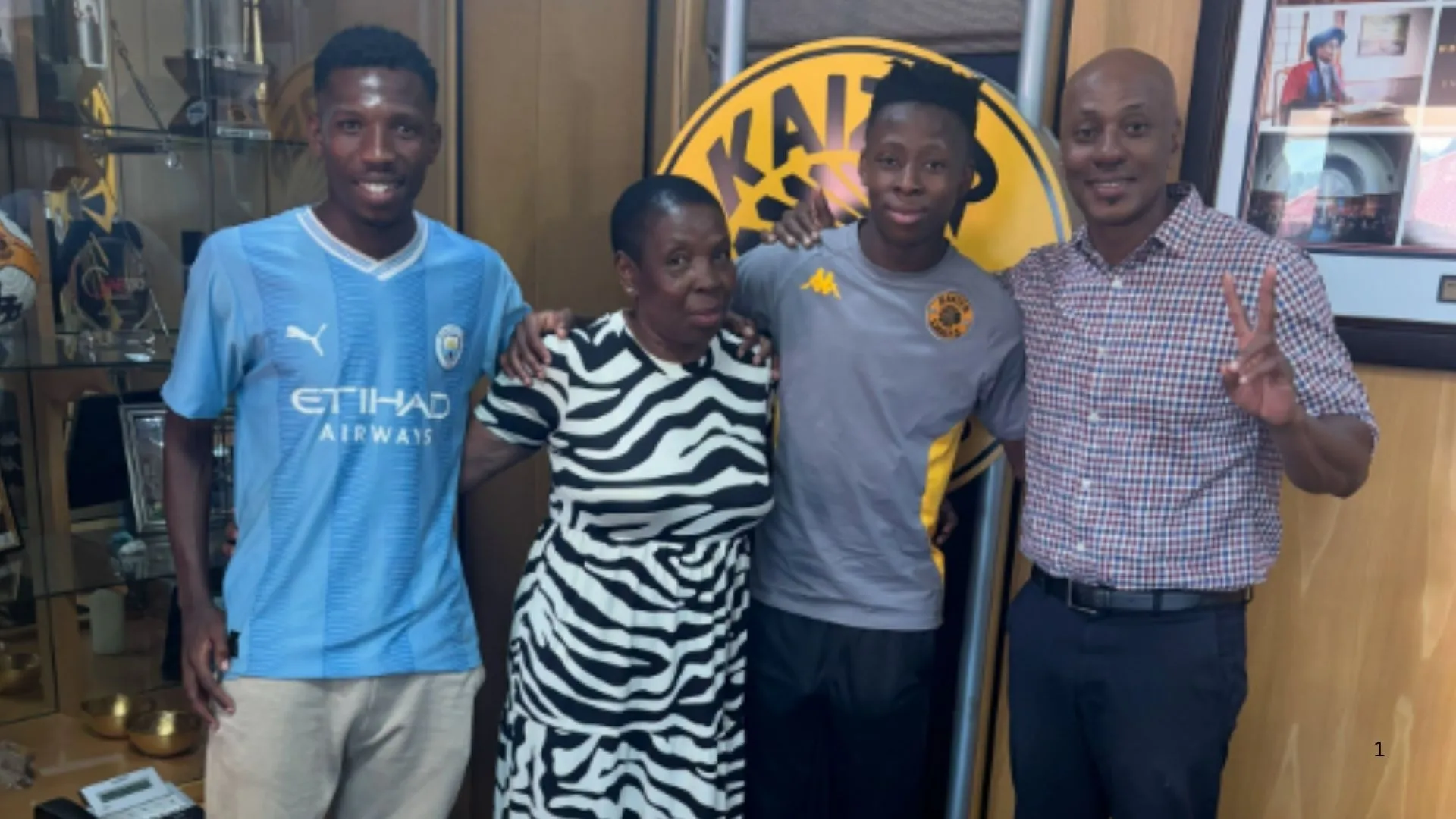 Kaizer Chiefs youngster Teboho Mlangeni and his family after signing a new contract.
