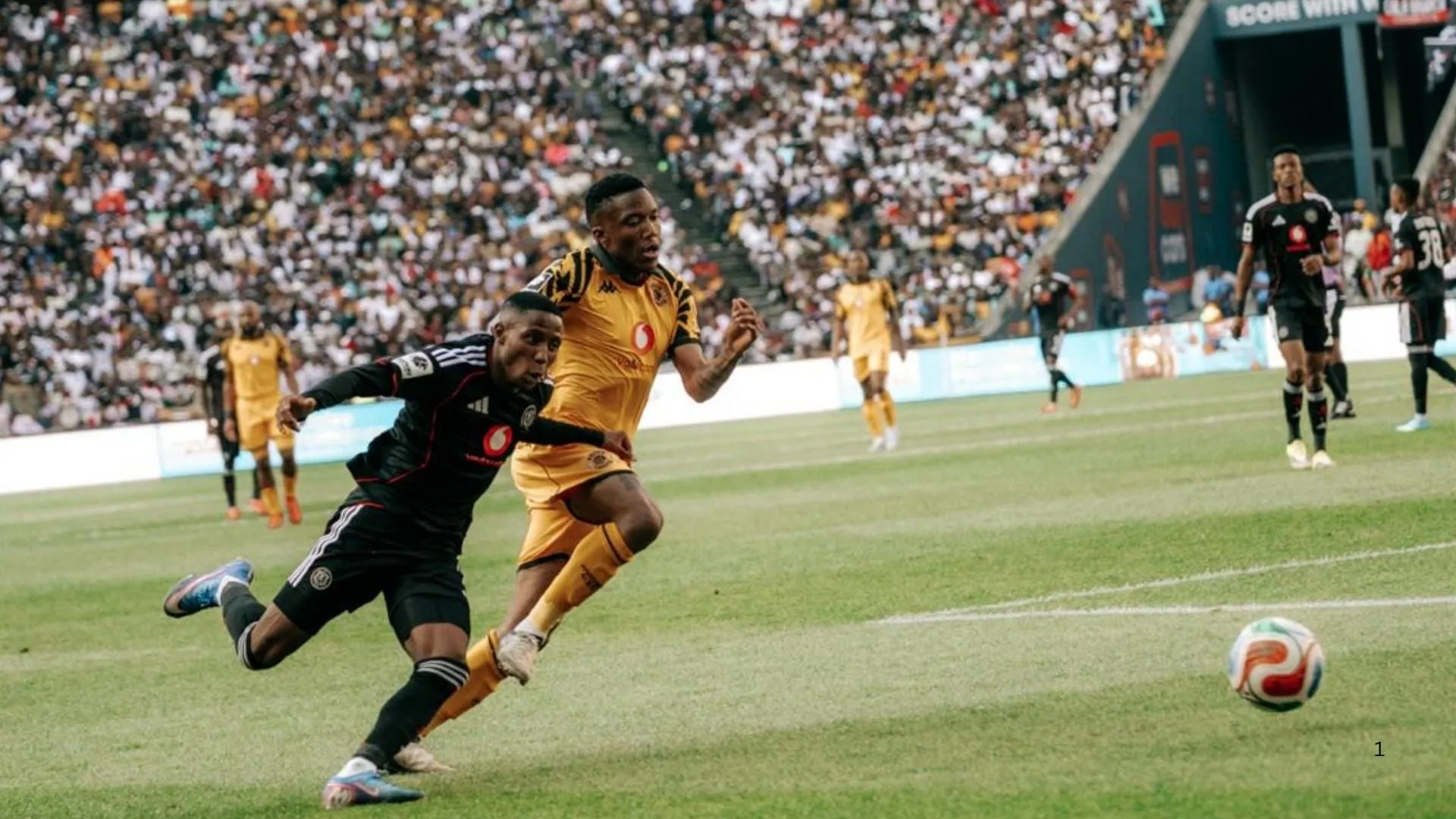 Tshepang Moremi of Orlando Pirates vies for the ball with Pule Mmodi of Kaizer Chiefs in the Soweto Derby.