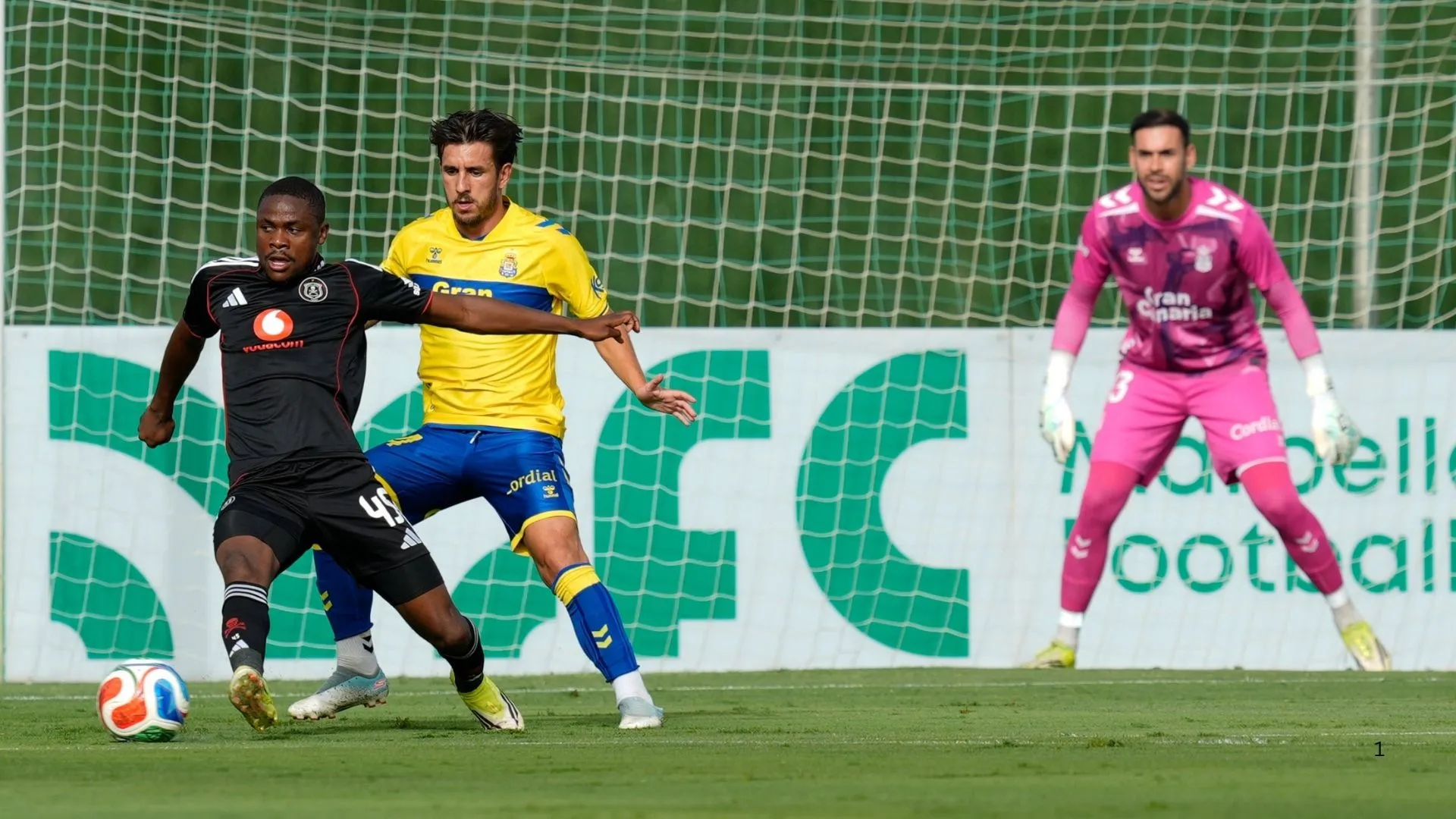 Daniel Msendani of Orlando Pirates shields the ball against Las Palmas.
