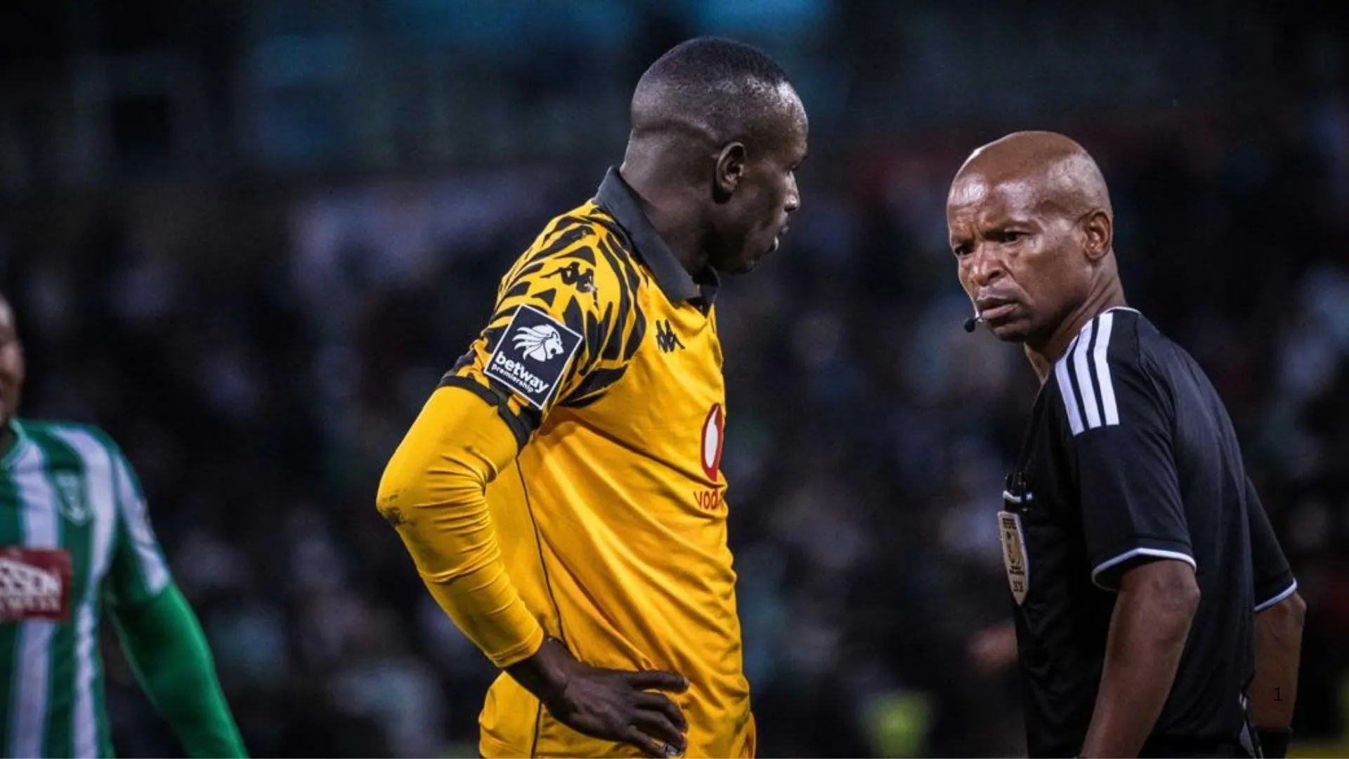 Kaizer Chiefs striker Flavio Silva with the referee.