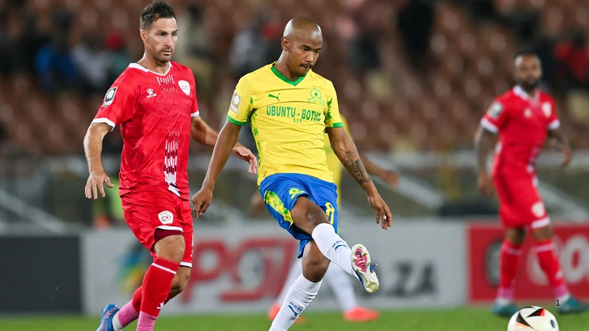 Jayden Adams of Mamelodi Sundowns against Sekhukhune's Bradley Grobbler.