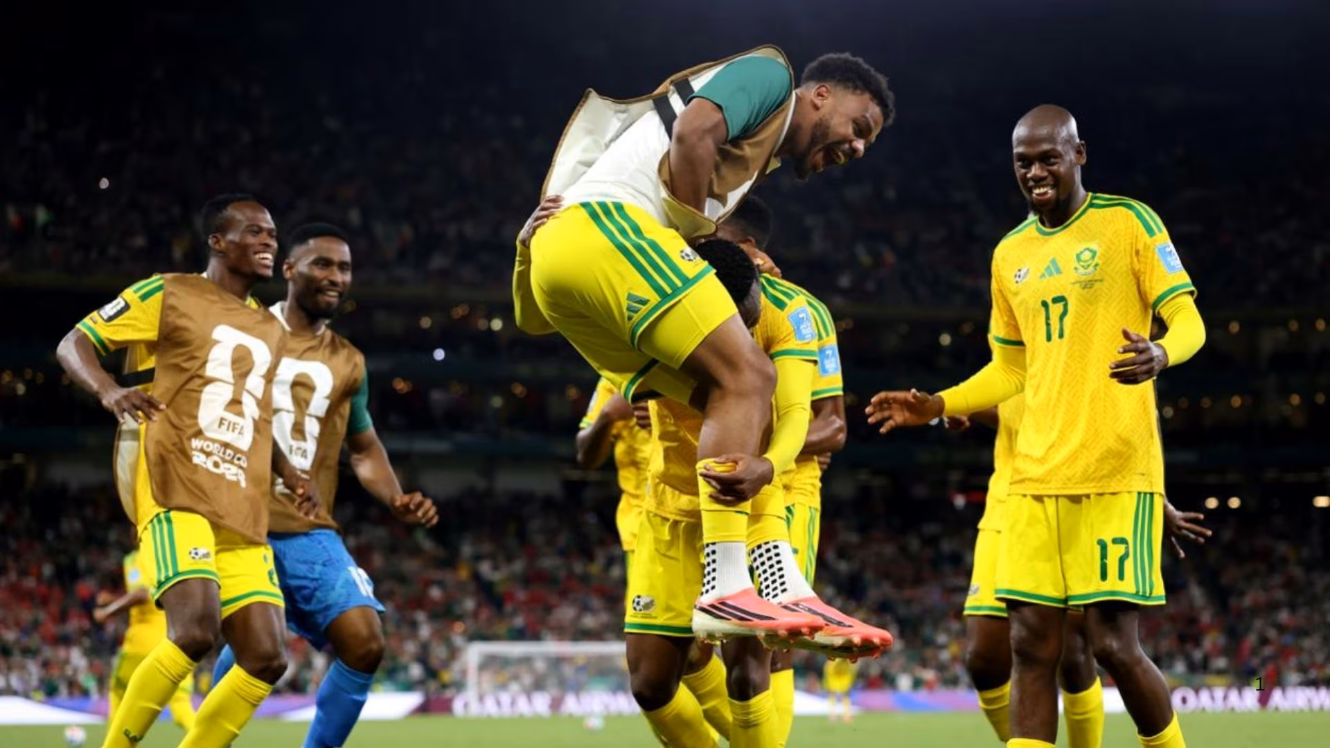 South Africa players celebrate World Cup victory against South Korea.