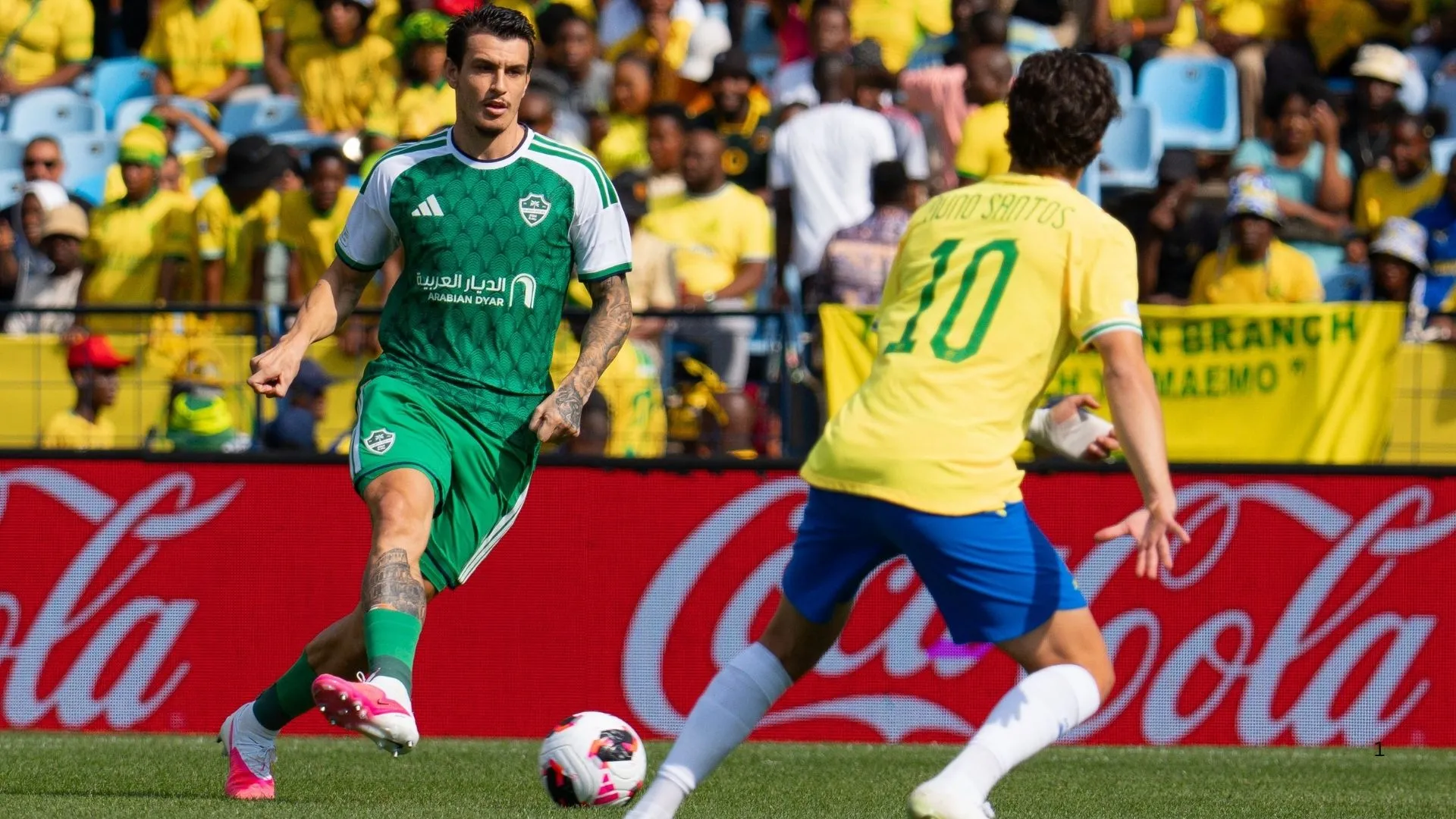 Nuno Santos of Mamelodi Sundowns facing off with Al Ahli.
